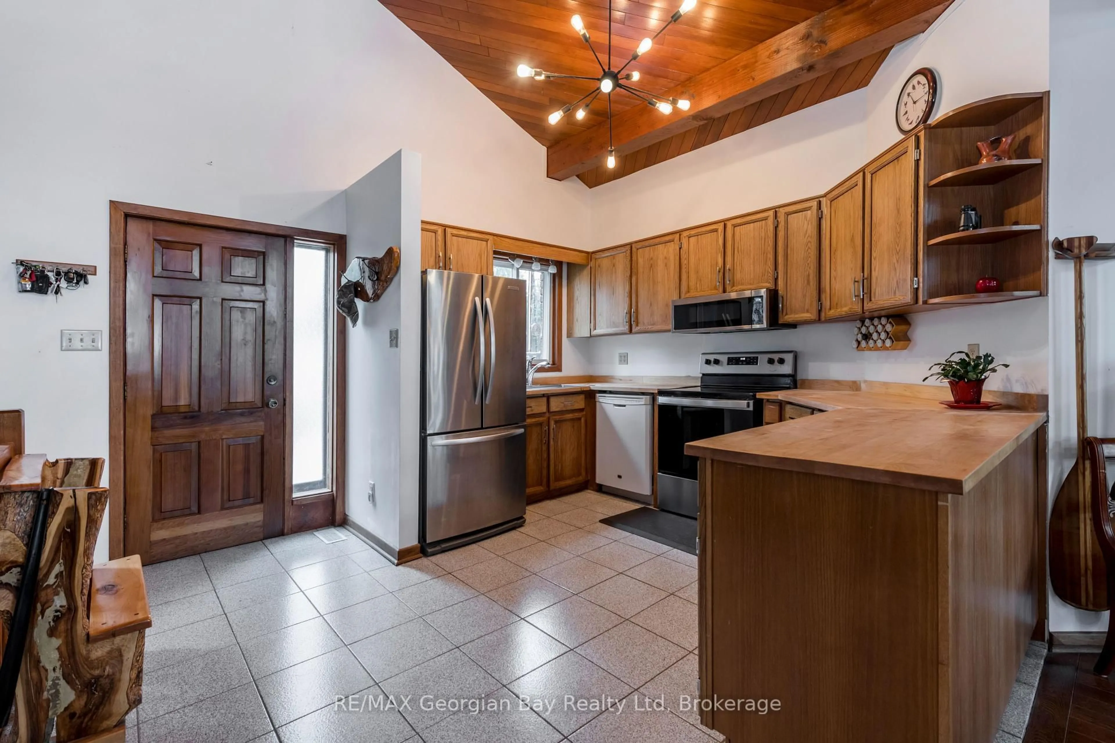 Open concept kitchen, ceramic/tile floor for 1246 Tiny Beaches Rd, Tiny Ontario L9M 0H7