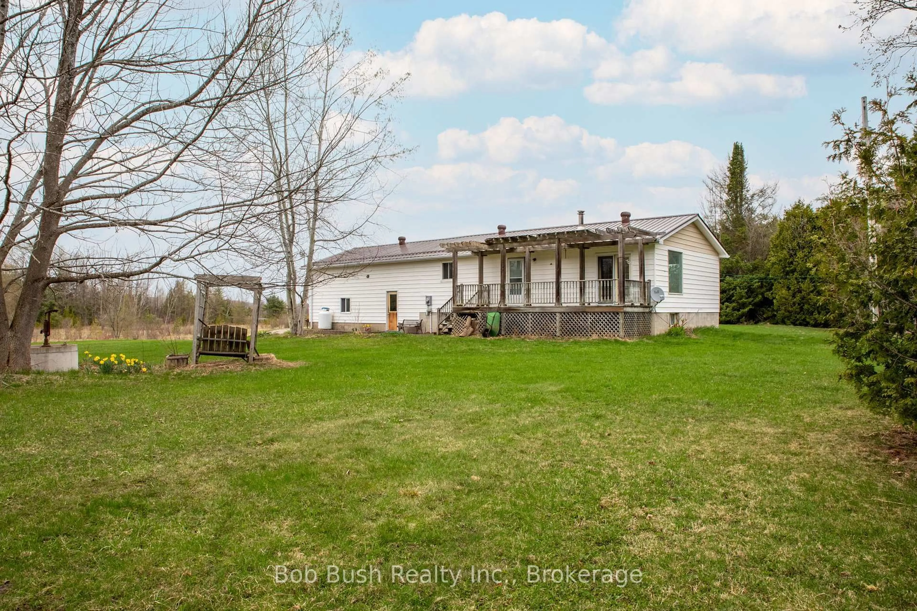 A pic from outside/outdoor area/front of a property/back of a property/a pic from drone, unknown for 10596 12 Highway, Oro-Medonte Ontario L0K 2G0