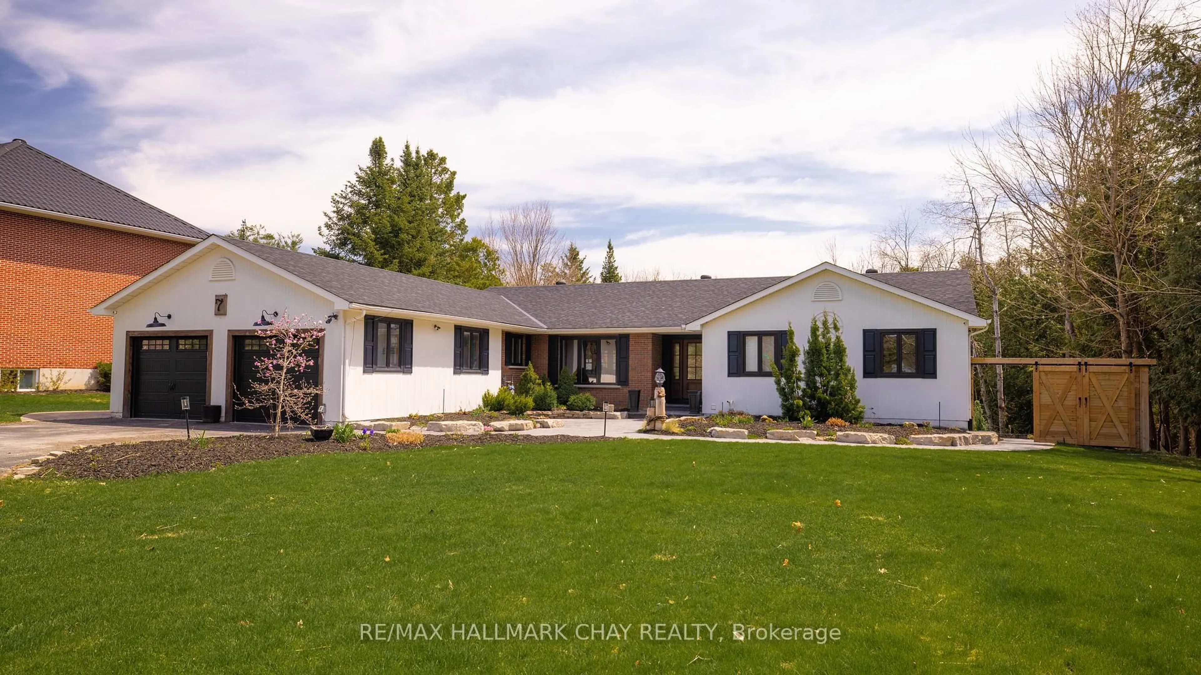 Home with vinyl exterior material, street for 7 Jodies Lane, Springwater Ontario L0L 1X1