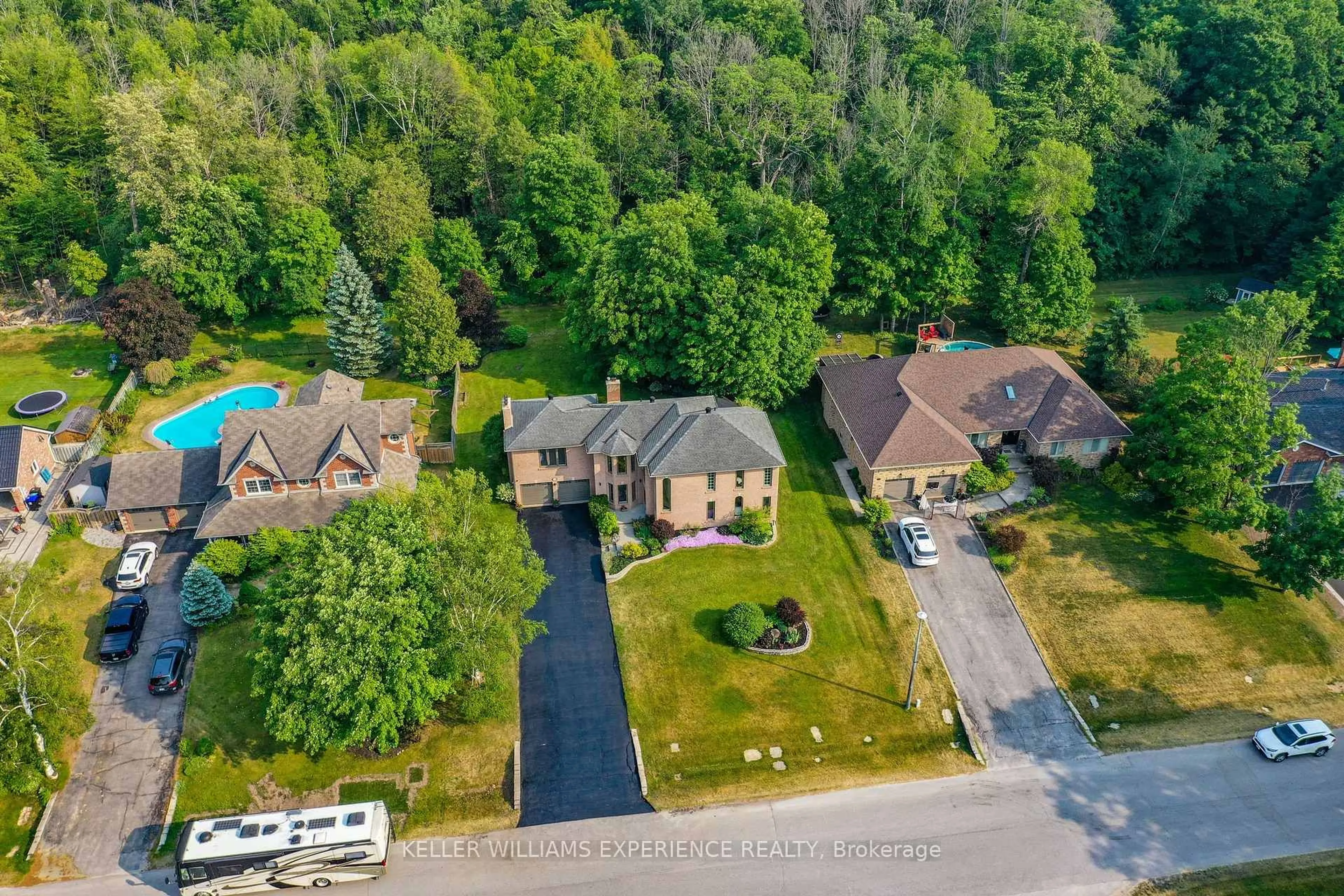 A pic from outside/outdoor area/front of a property/back of a property/a pic from drone, street for 19 Priest Ave, Springwater Ontario L9X 0G9