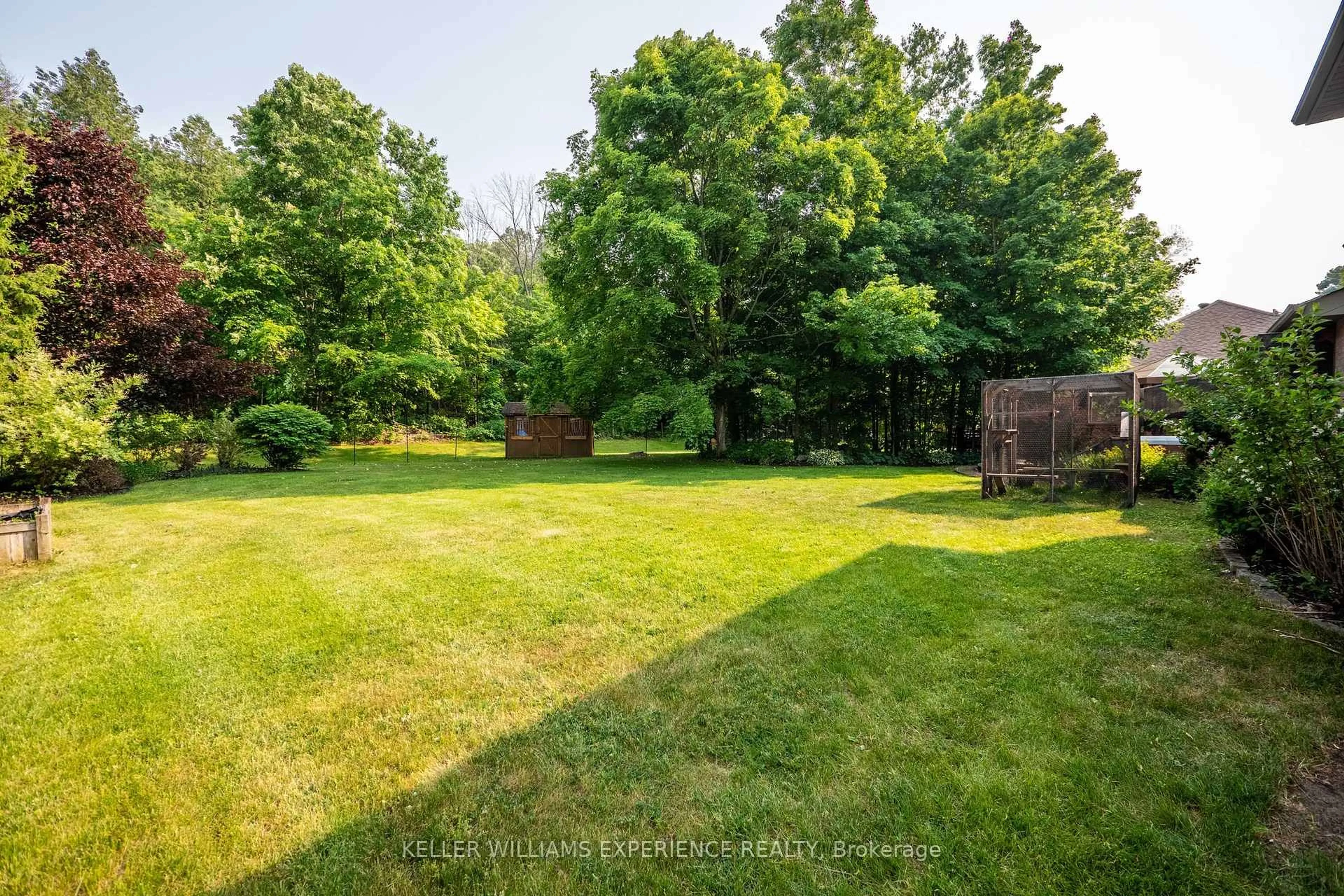 A pic from outside/outdoor area/front of a property/back of a property/a pic from drone, forest/trees view for 19 Priest Ave, Springwater Ontario L9X 0G9