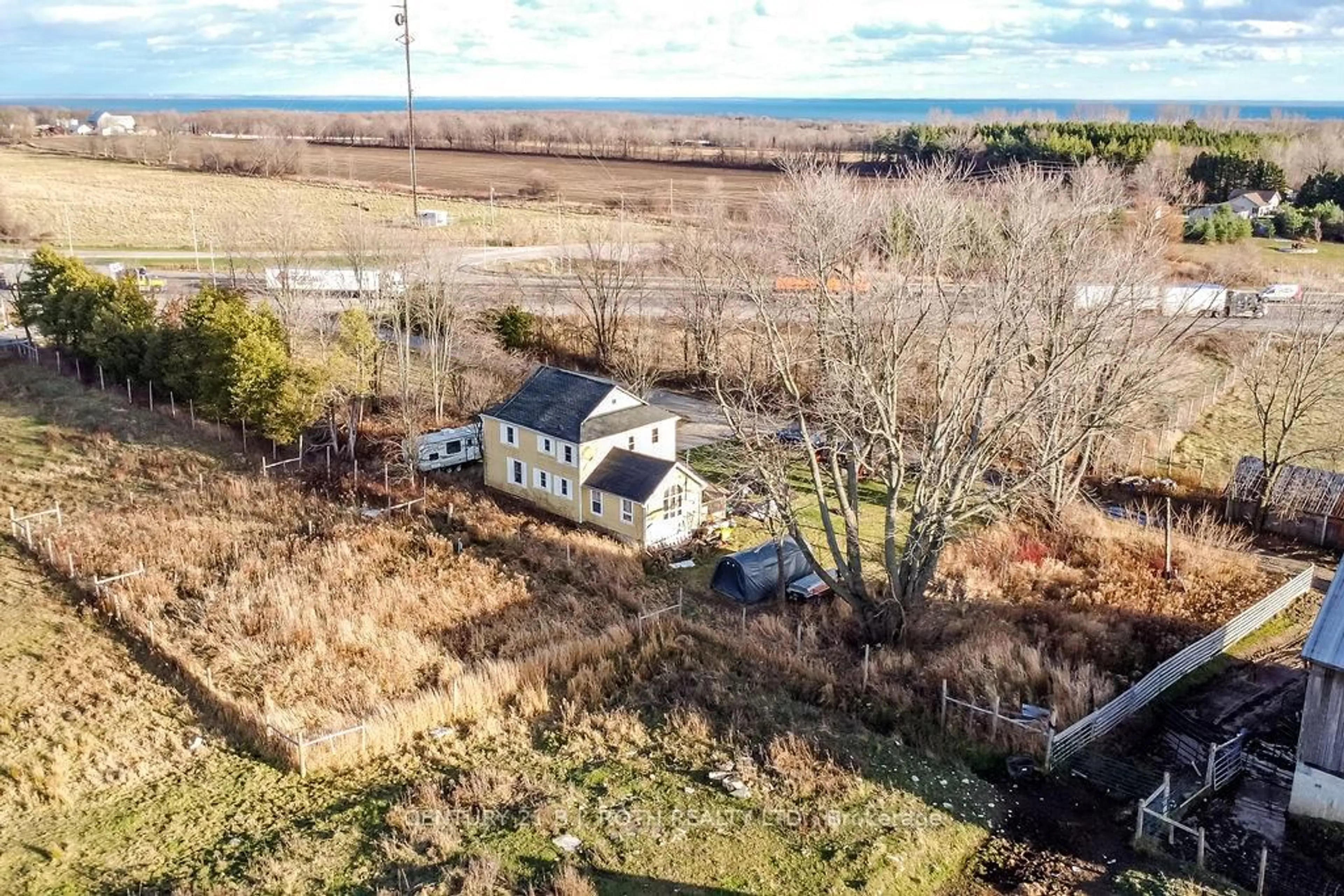 A pic from outside/outdoor area/front of a property/back of a property/a pic from drone, unknown for 10 12 Line, Oro-Medonte Ontario L0L 1T0