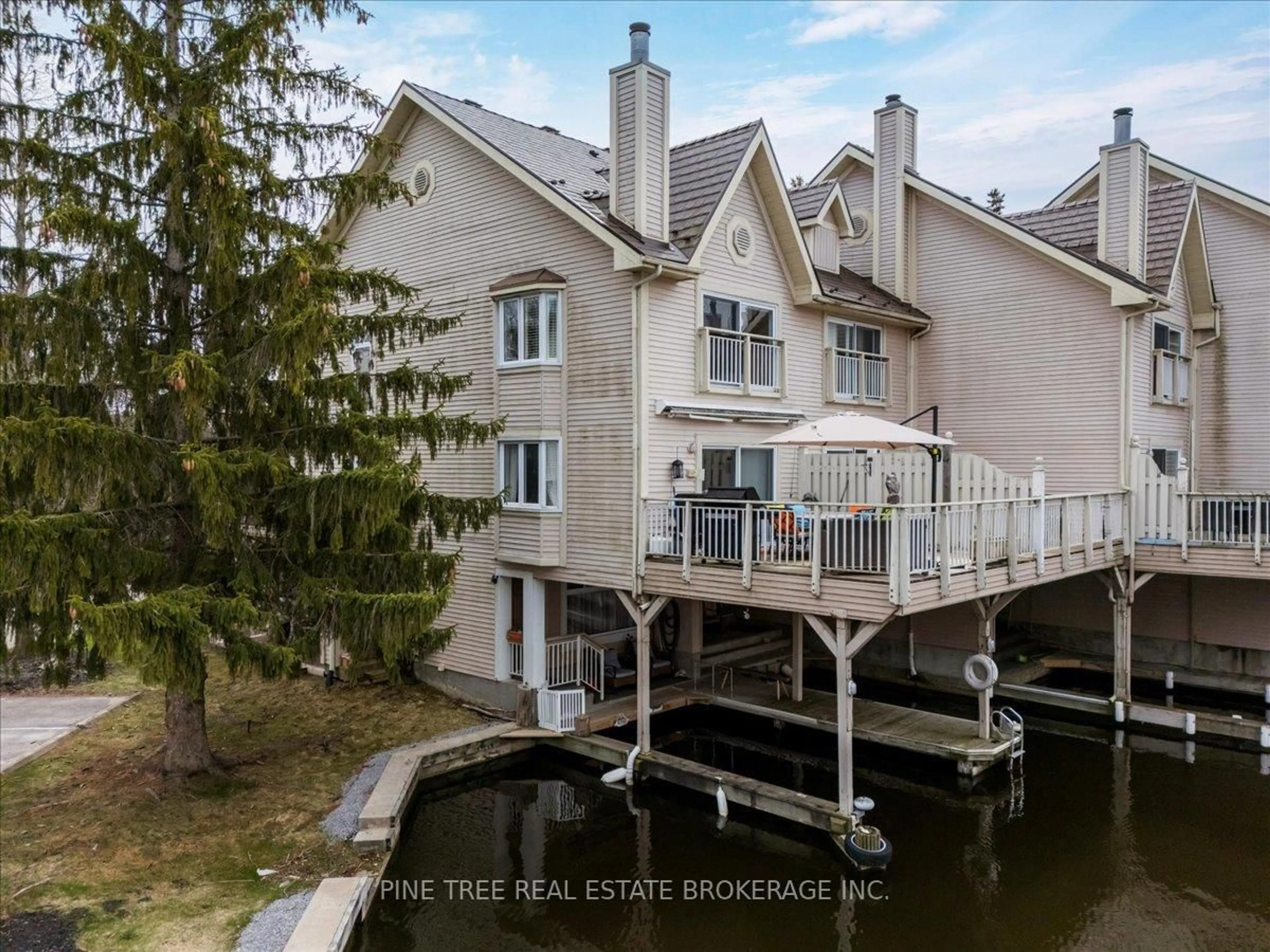 A pic from outside/outdoor area/front of a property/back of a property/a pic from drone, water/lake/river/ocean view for 100 Laguna Pkwy #8, Ramara Ontario L0K 1B0
