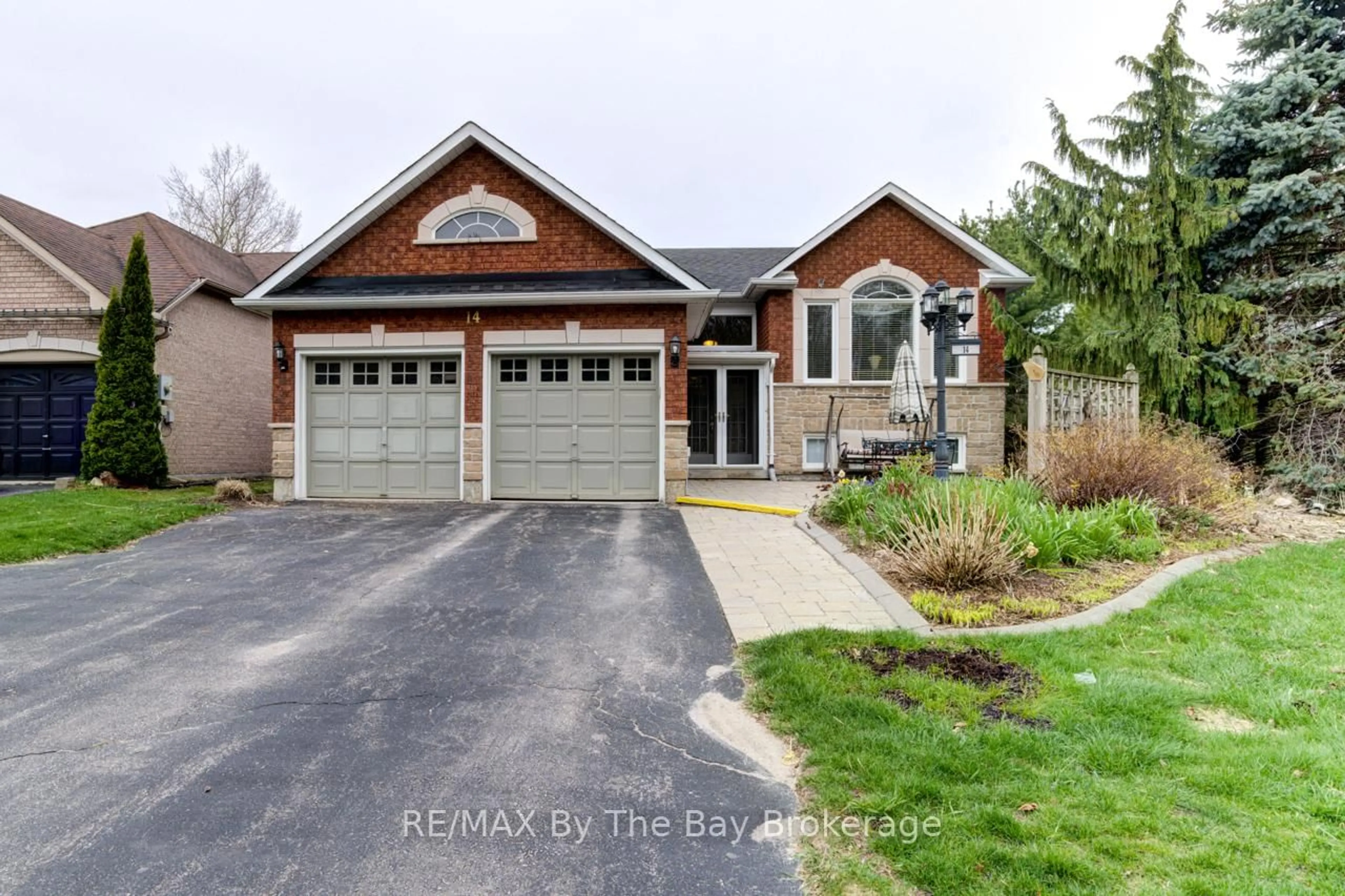 Home with brick exterior material, street for 14 Timberland Cres, Wasaga Beach Ontario L9Z 1G7
