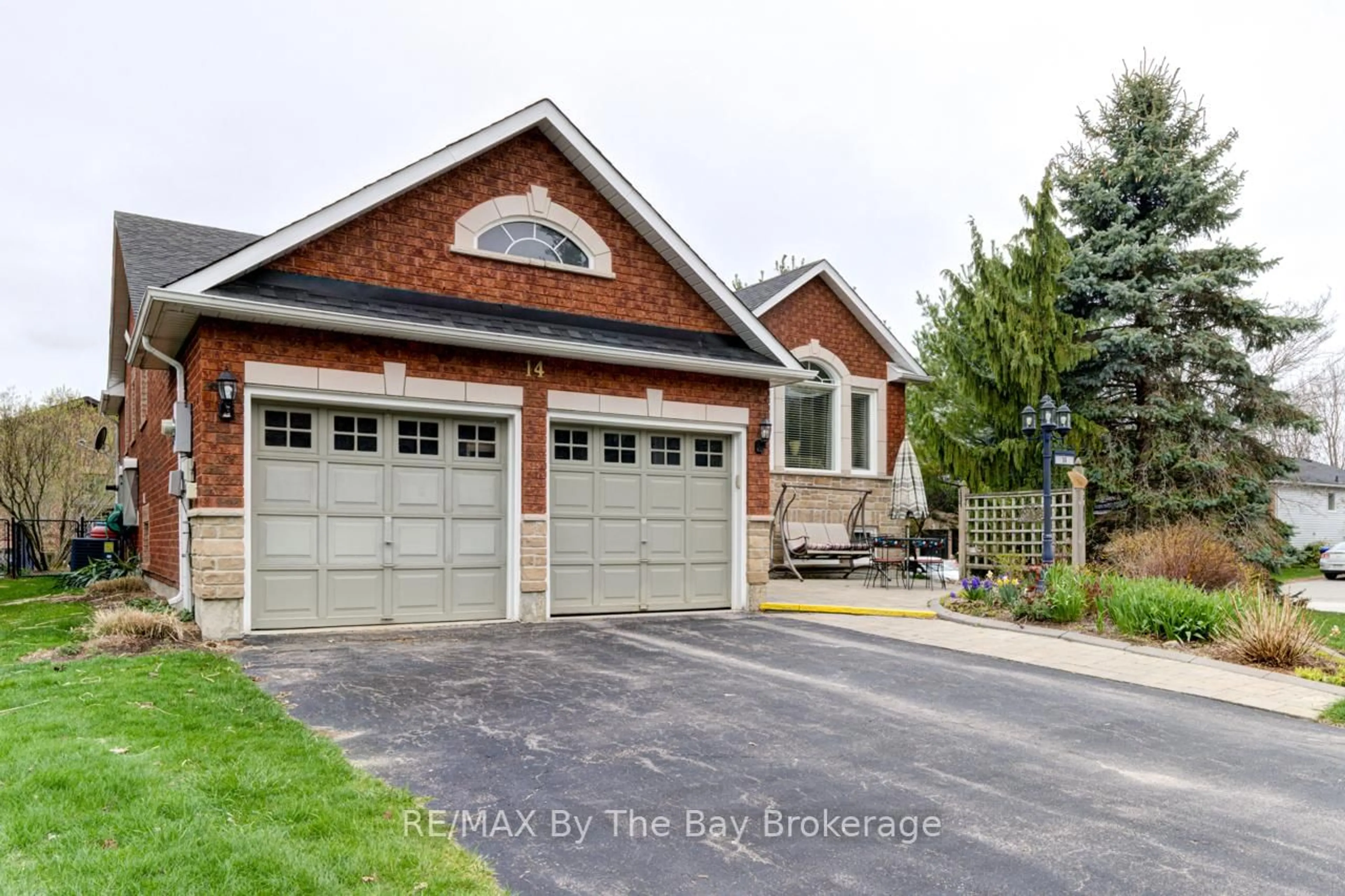Home with brick exterior material, street for 14 Timberland Cres, Wasaga Beach Ontario L9Z 1G7