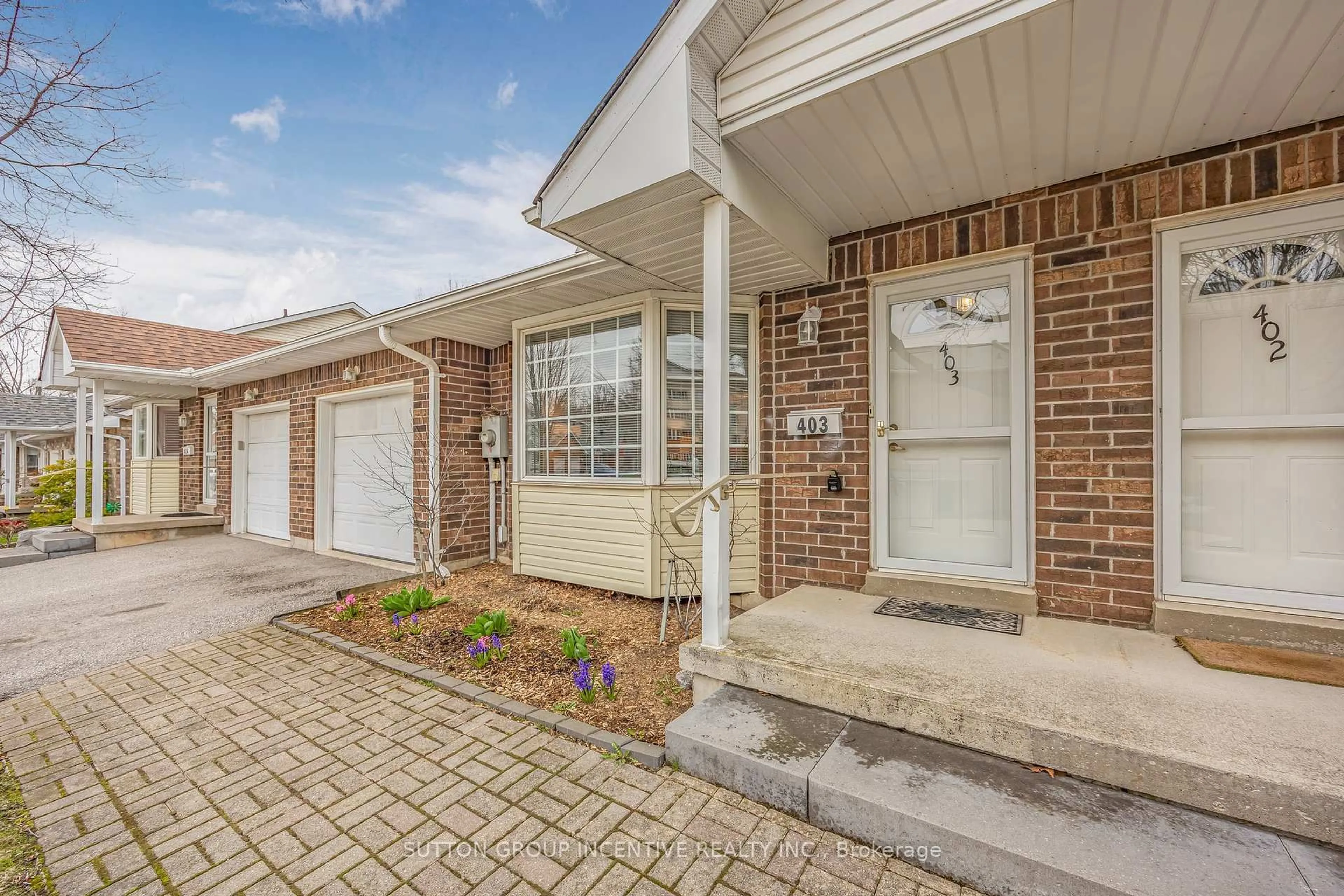 Home with brick exterior material, street for 40 Museum Dr #403, Orillia Ontario L3V 7T9