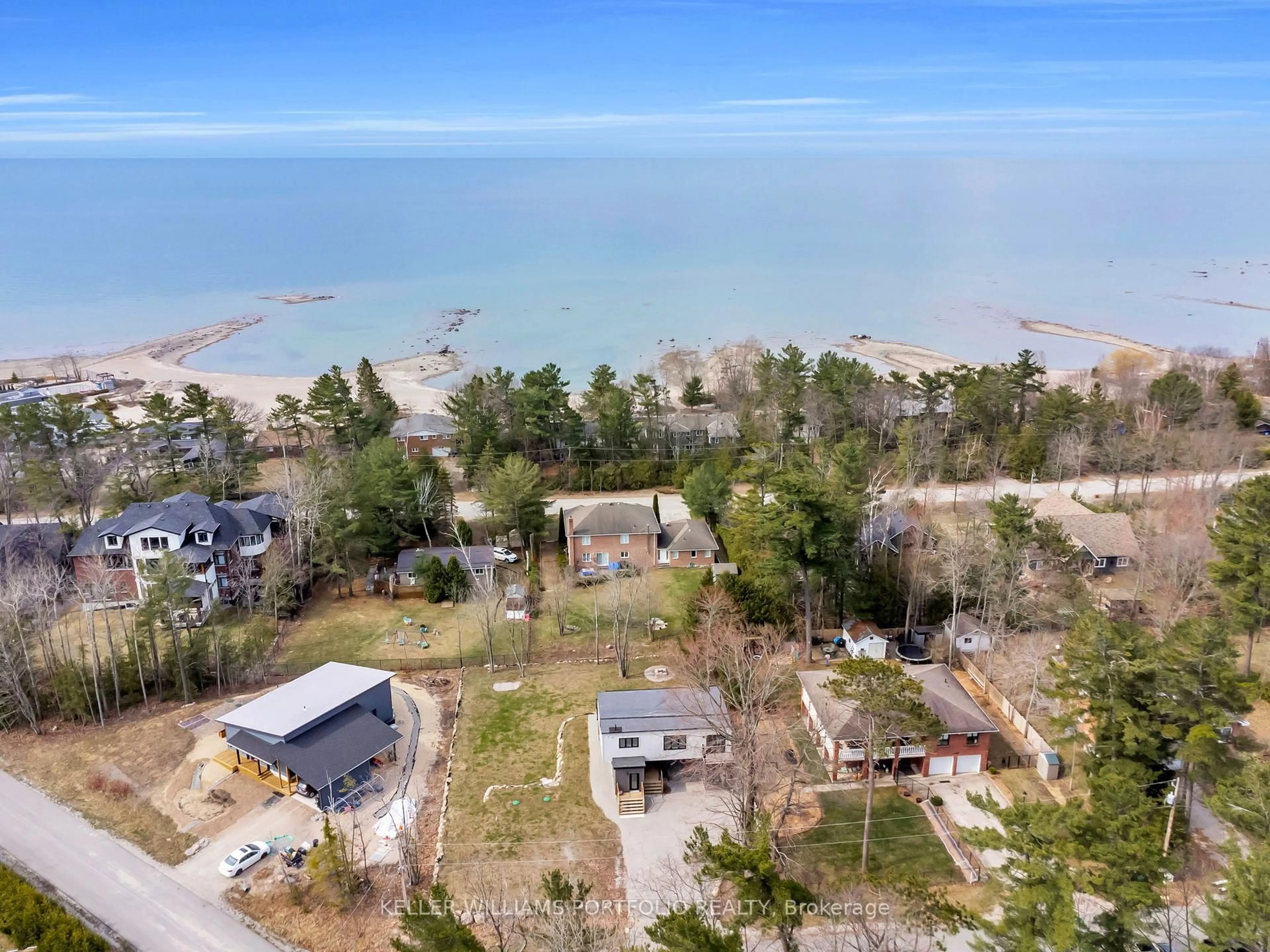 A pic from outside/outdoor area/front of a property/back of a property/a pic from drone, water/lake/river/ocean view for 2 Grosvenor Dr, Tiny Ontario L9M 0J2
