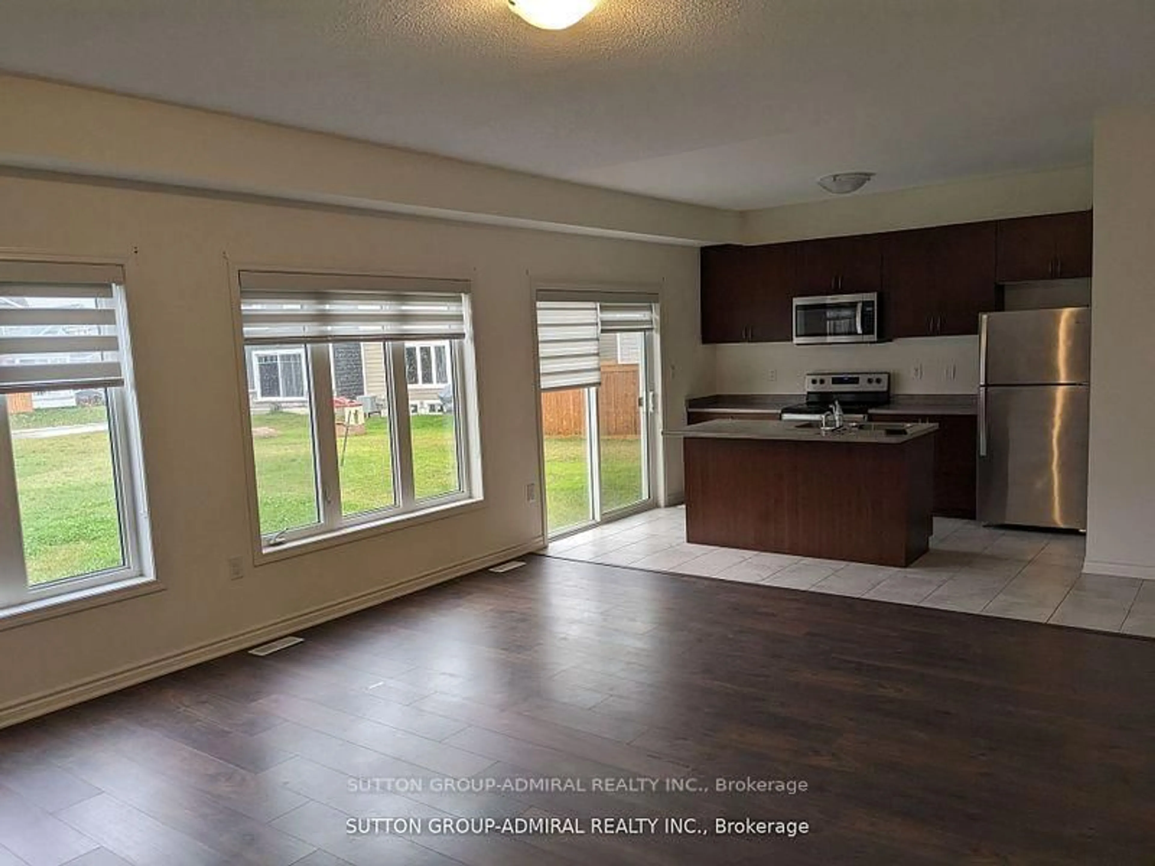 Open concept kitchen, unknown for 23 Hills Thistle Dr, Wasaga Beach Ontario L9Z 0J3