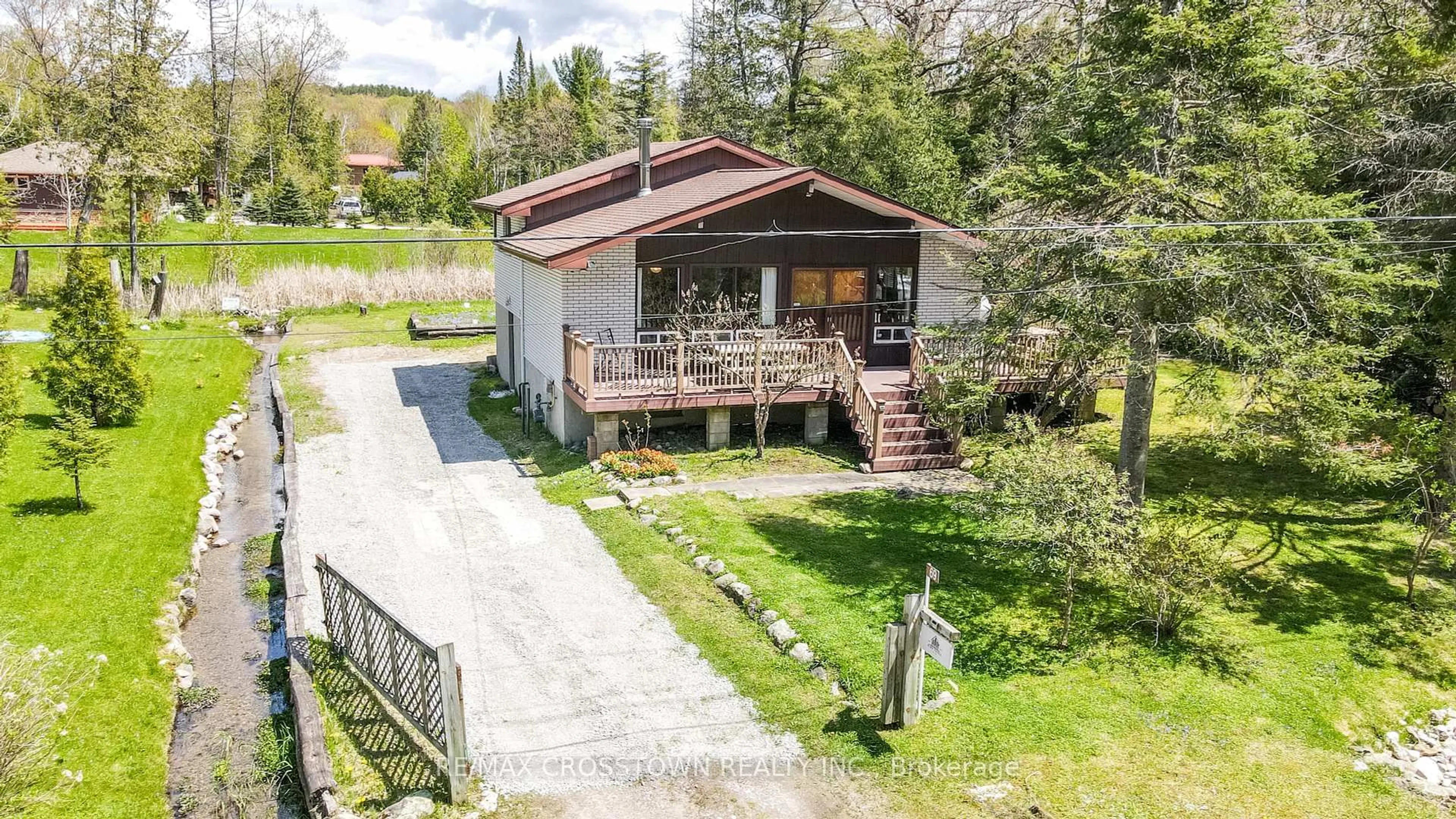 A pic from outside/outdoor area/front of a property/back of a property/a pic from drone, street for 69 Lesperance Rd, Tiny Ontario L0L 2J0