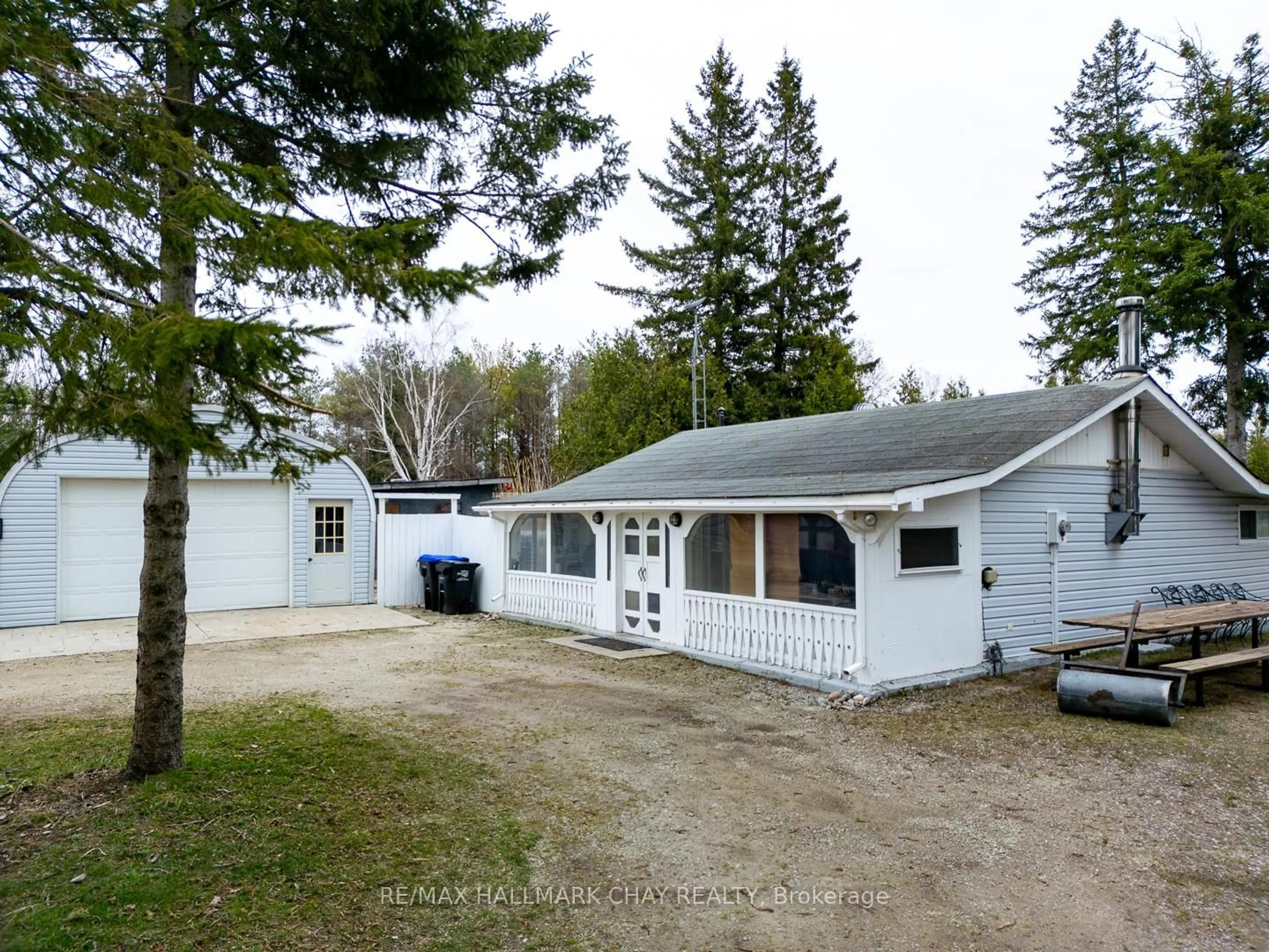 A pic from outside/outdoor area/front of a property/back of a property/a pic from drone, street for 1761 County 92 Rd, Springwater Ontario L0L 1P0
