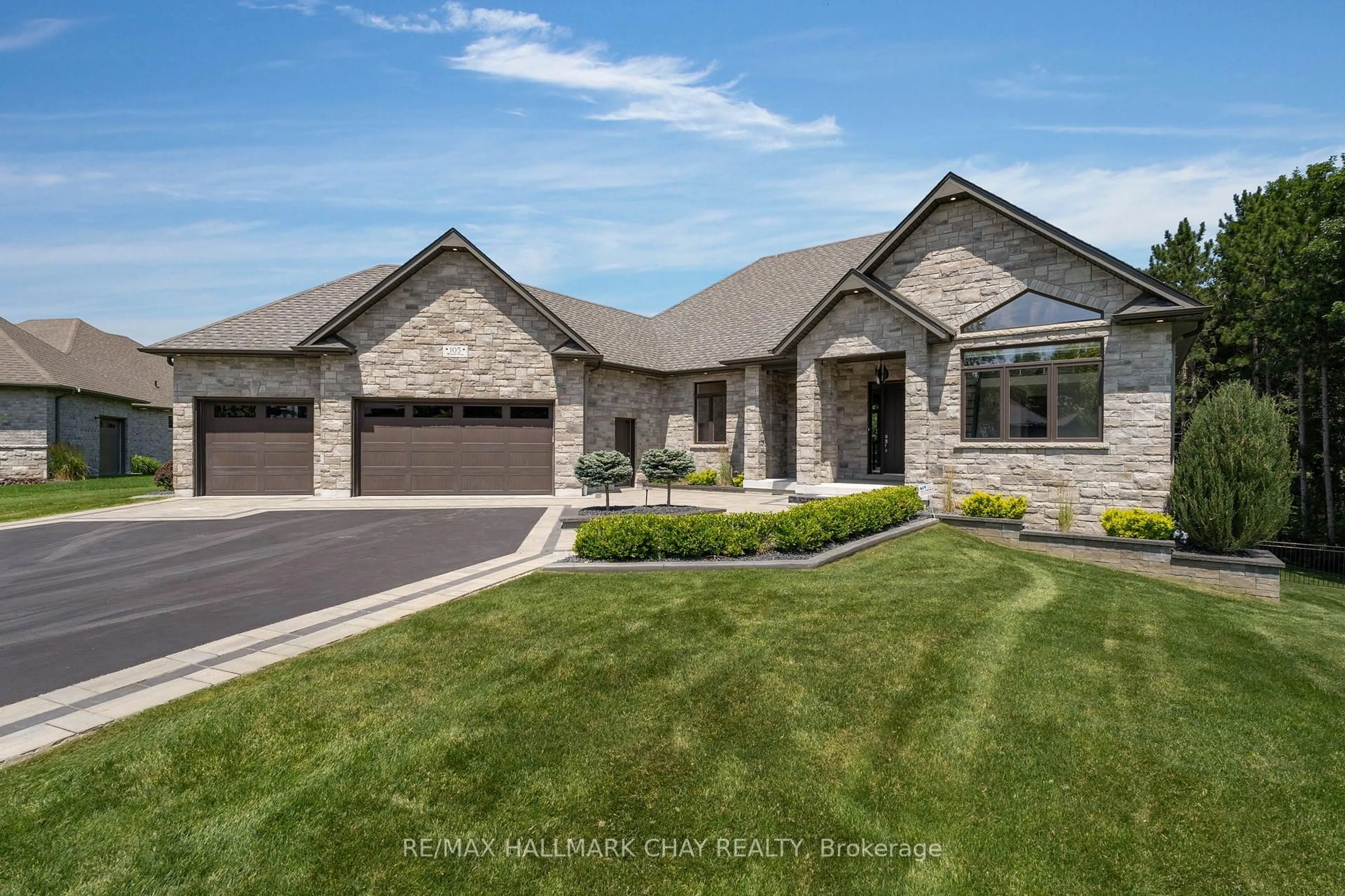 Home with brick exterior material, street for 105 Mennill Dr, Springwater Ontario L0L 1Y3