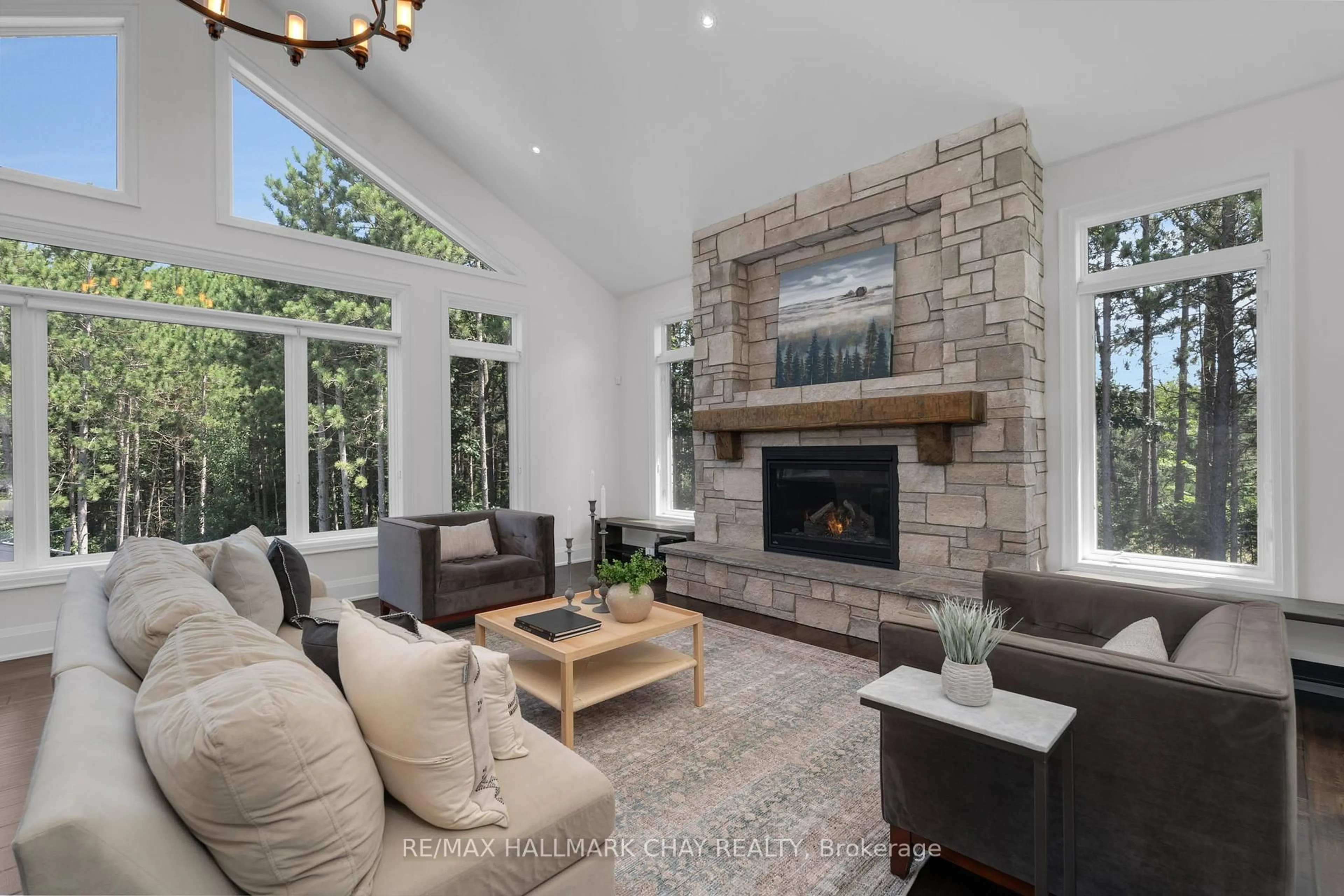Living room with furniture, unknown for 105 Mennill Dr, Springwater Ontario L0L 1Y3