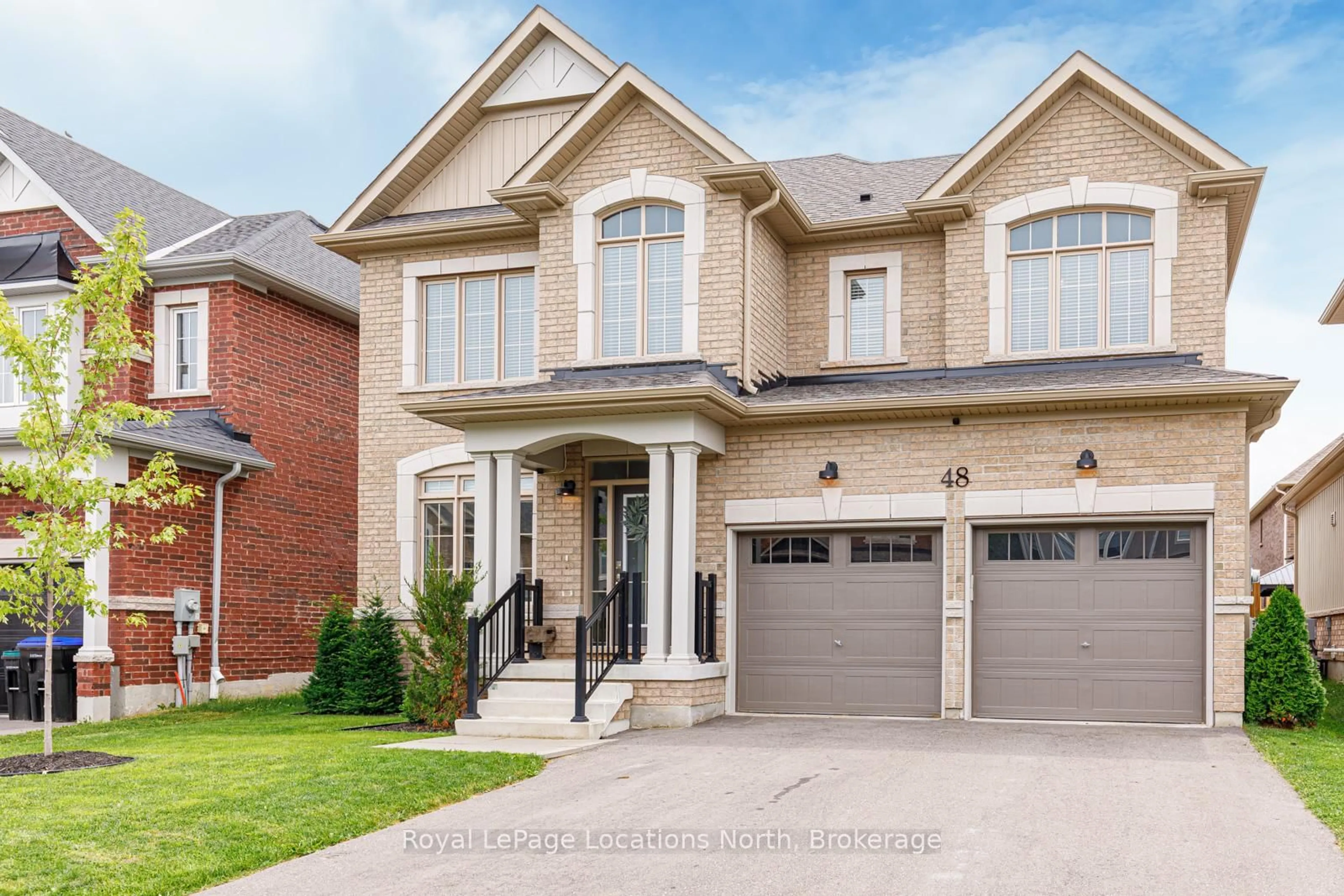 Home with brick exterior material, street for 48 Mclean Ave, Collingwood Ontario L9Y 3Z6