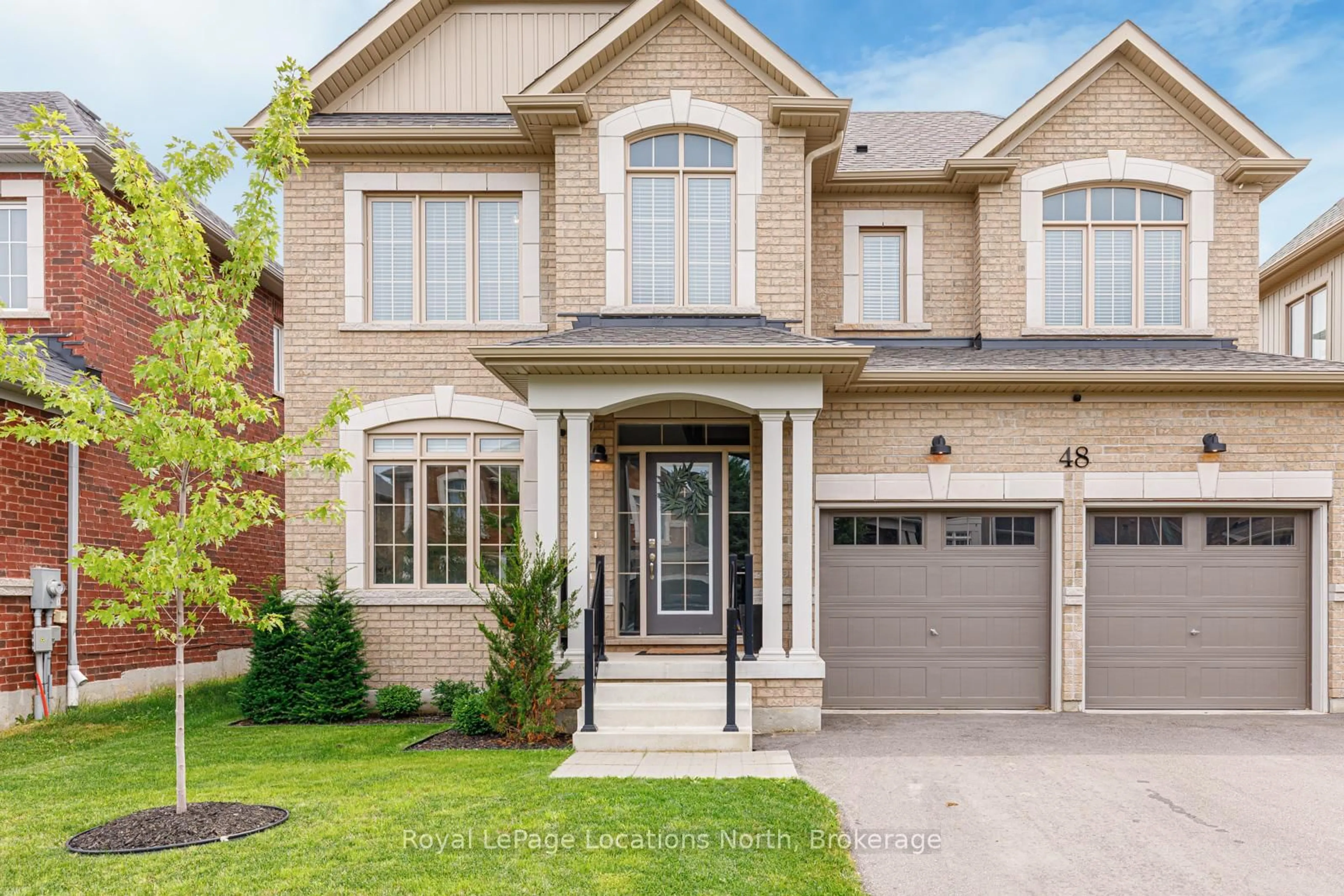 Home with brick exterior material, street for 48 Mclean Ave, Collingwood Ontario L9Y 3Z6