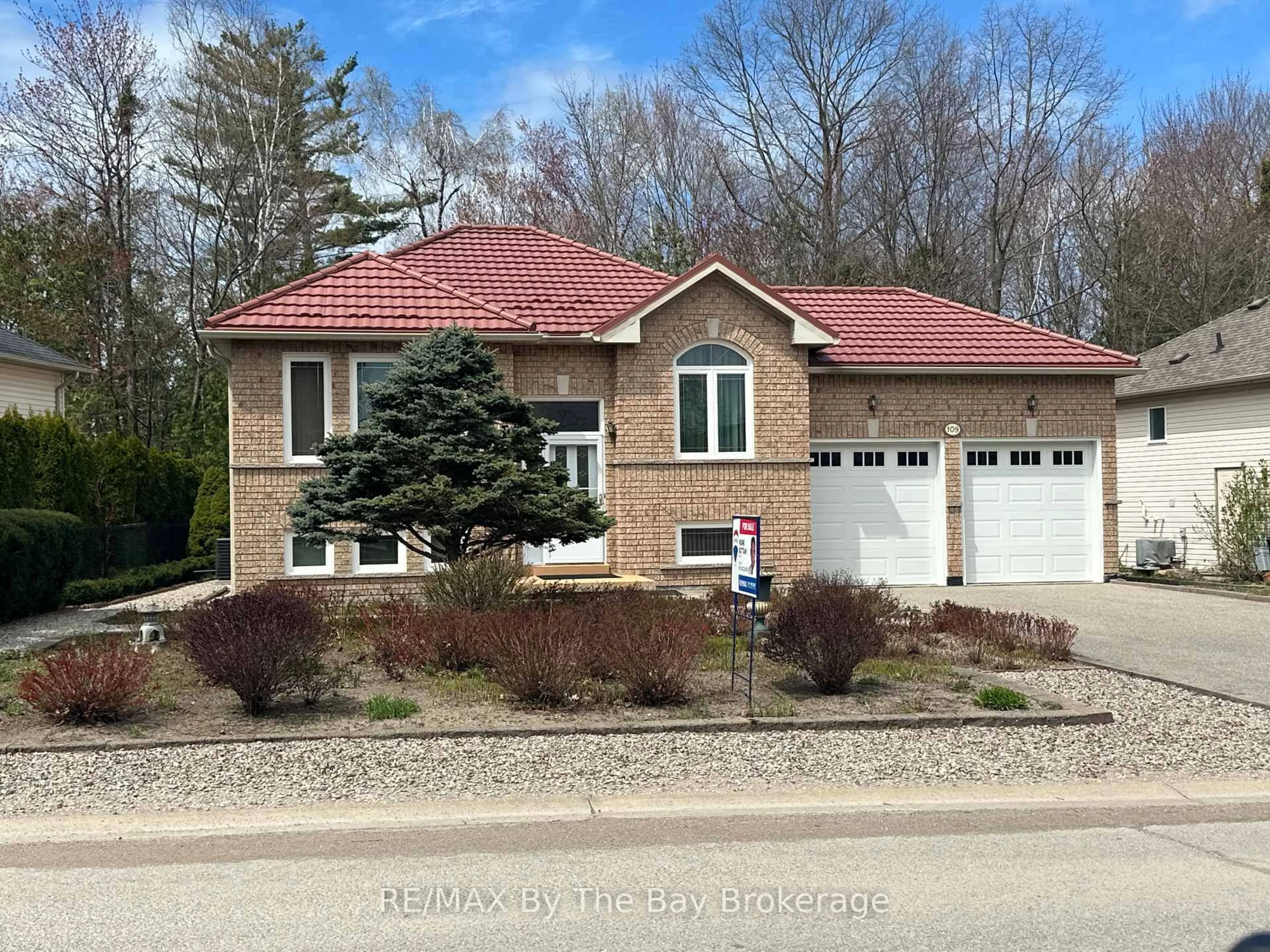 Home with brick exterior material, street for 109 Silver Birch Ave, Wasaga Beach Ontario L9Z 1N2