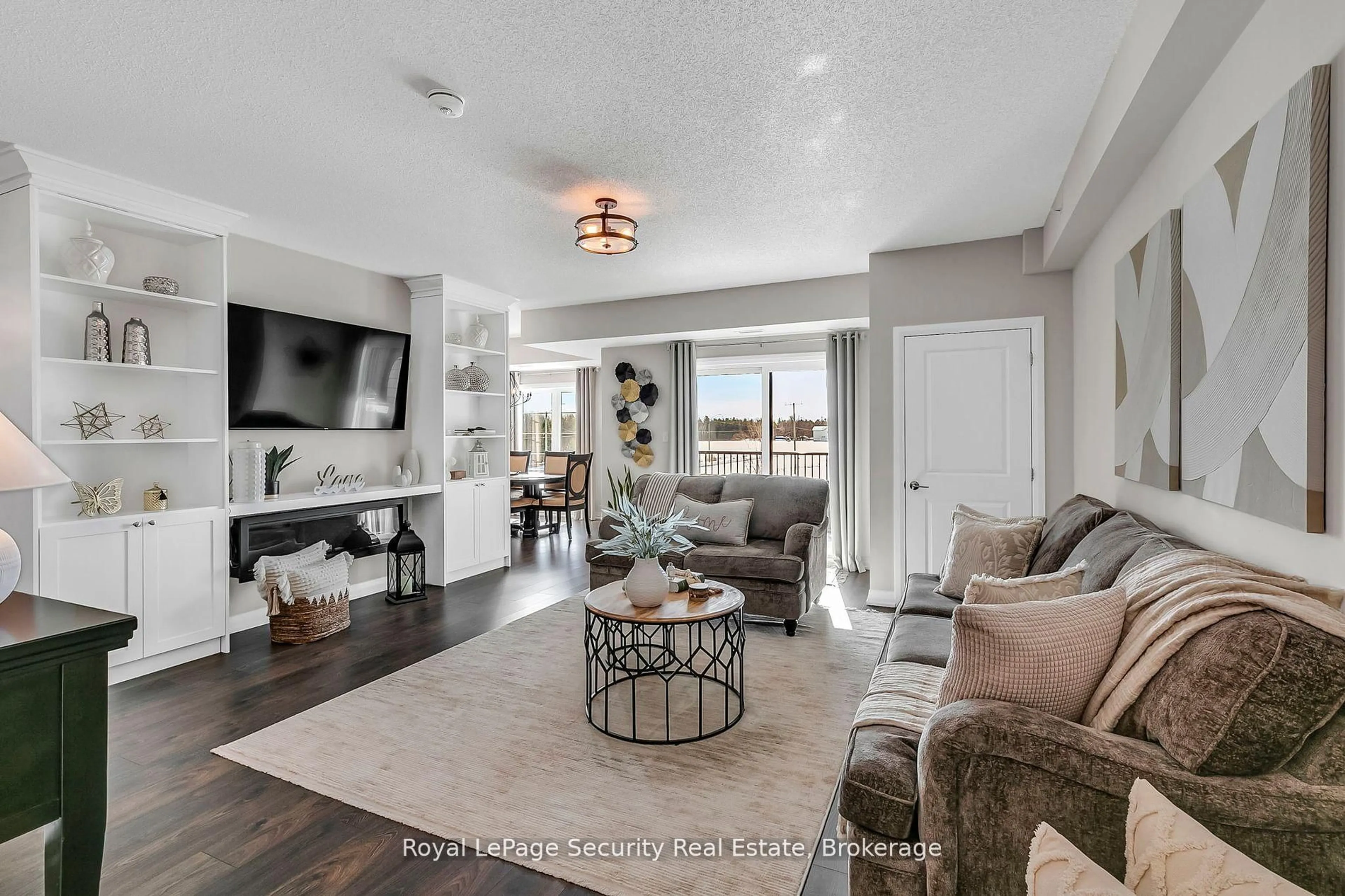 Living room with furniture, unknown for 54 Koda St #217, Barrie Ontario L9J 0J6