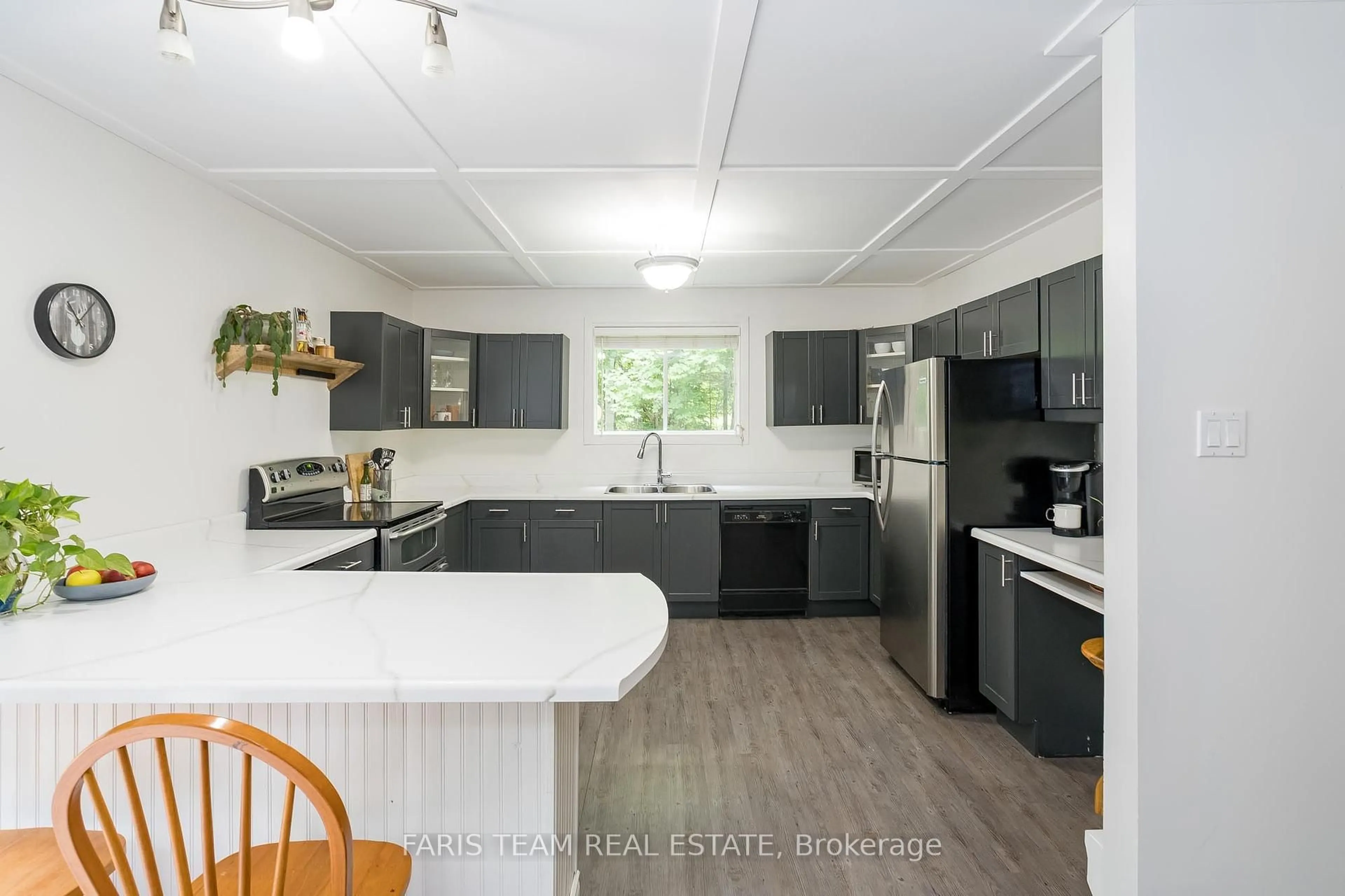 Open concept kitchen, unknown for 2420 Champlain Rd, Tiny Ontario L9M 0C9