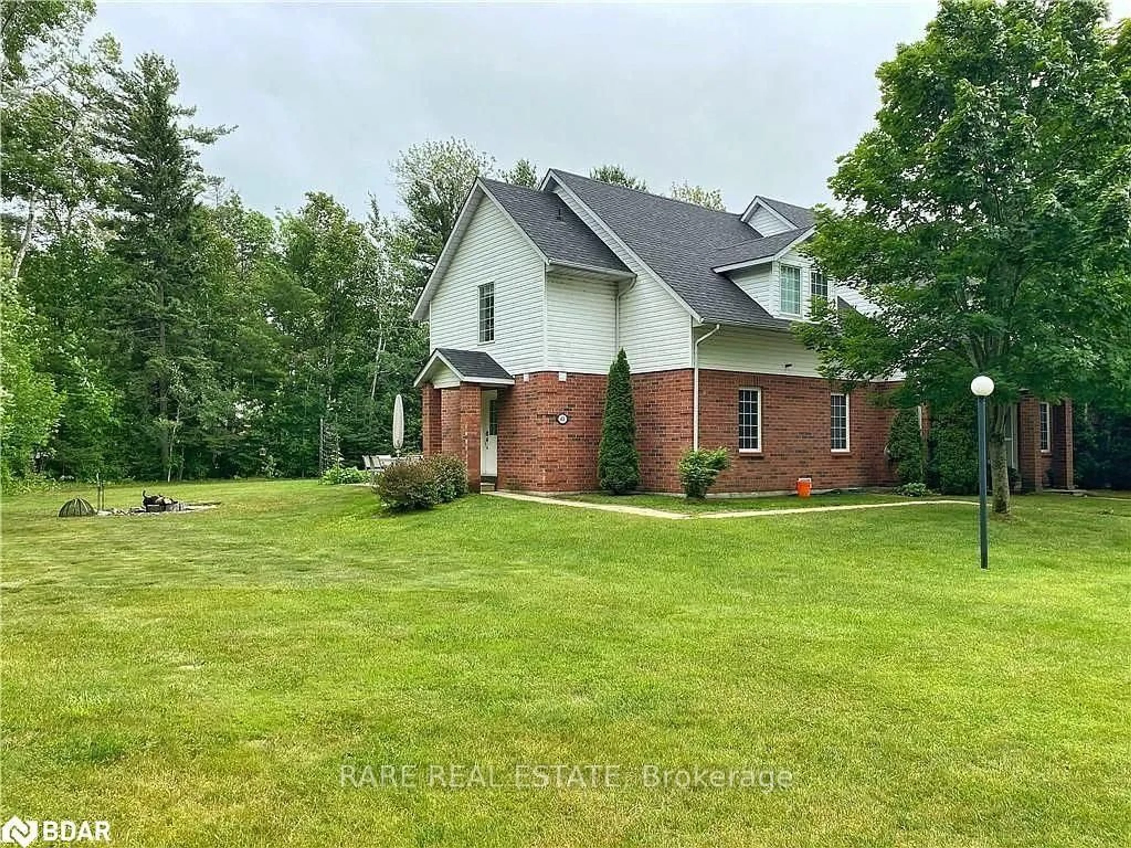 Home with brick exterior material, unknown for 40 Wasaga Woods Circ, Wasaga Beach Ontario L9Z 2Y9