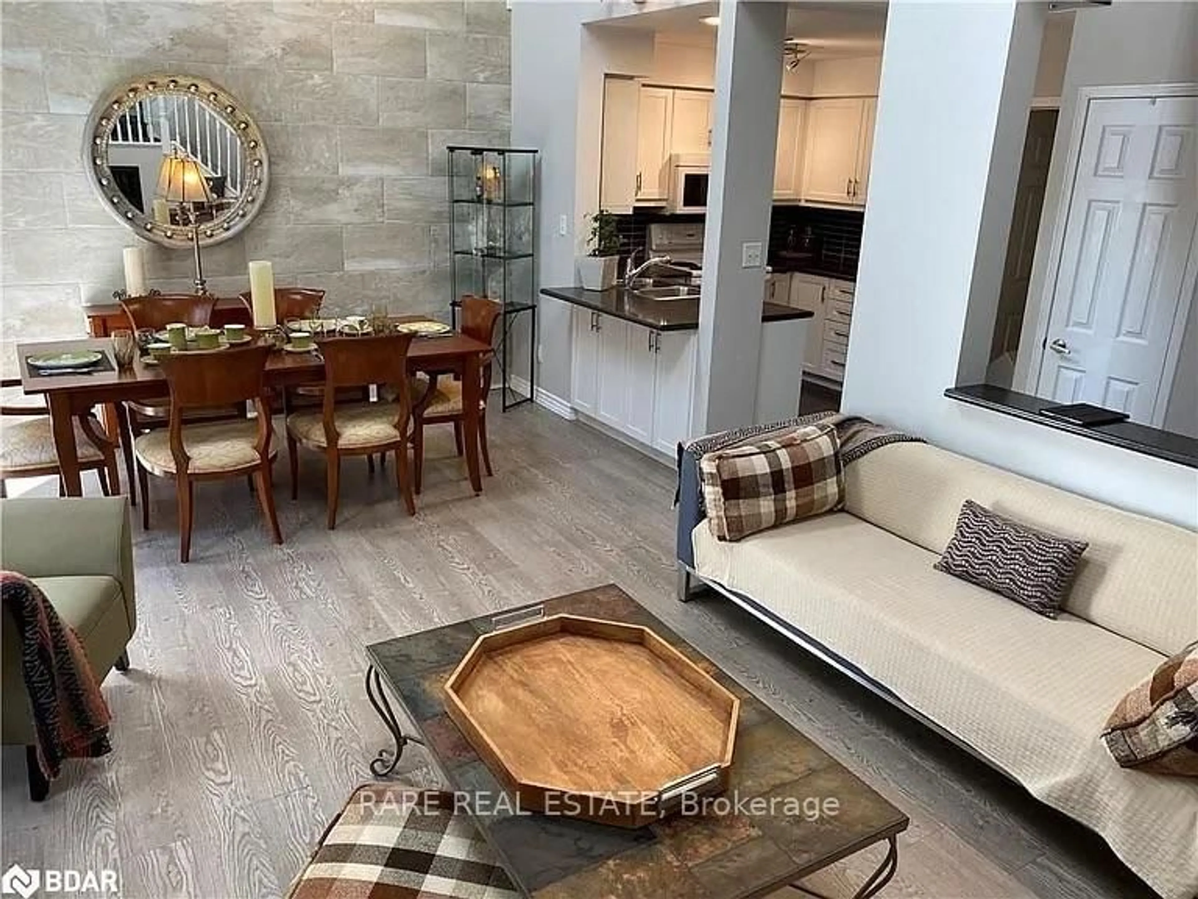 Living room with furniture, ceramic/tile floor for 40 Wasaga Woods Circ, Wasaga Beach Ontario L9Z 2Y9