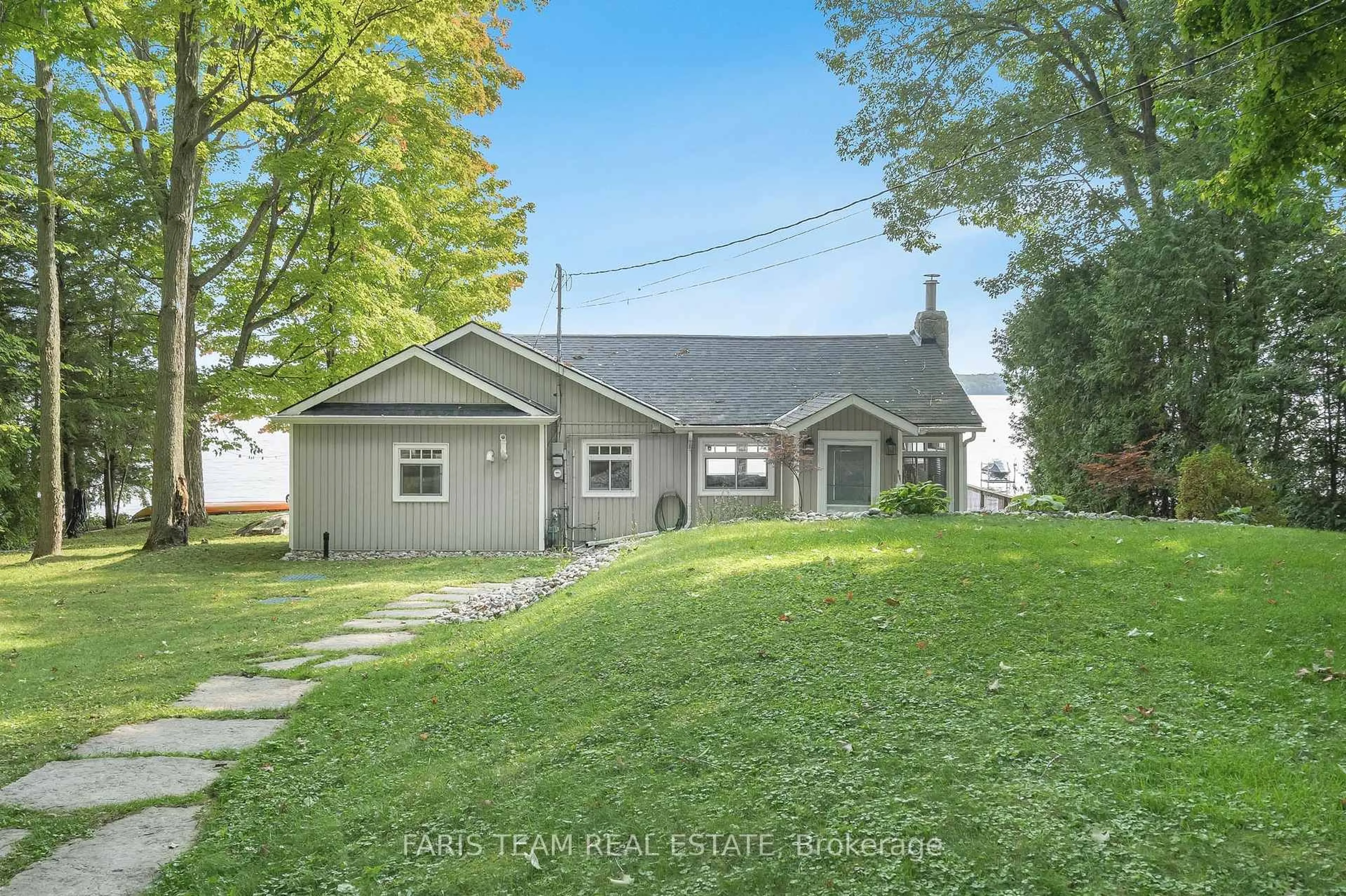 A pic from outside/outdoor area/front of a property/back of a property/a pic from drone, water/lake/river/ocean view for 1449 Champlain Rd, Tiny Ontario L9M 0C1