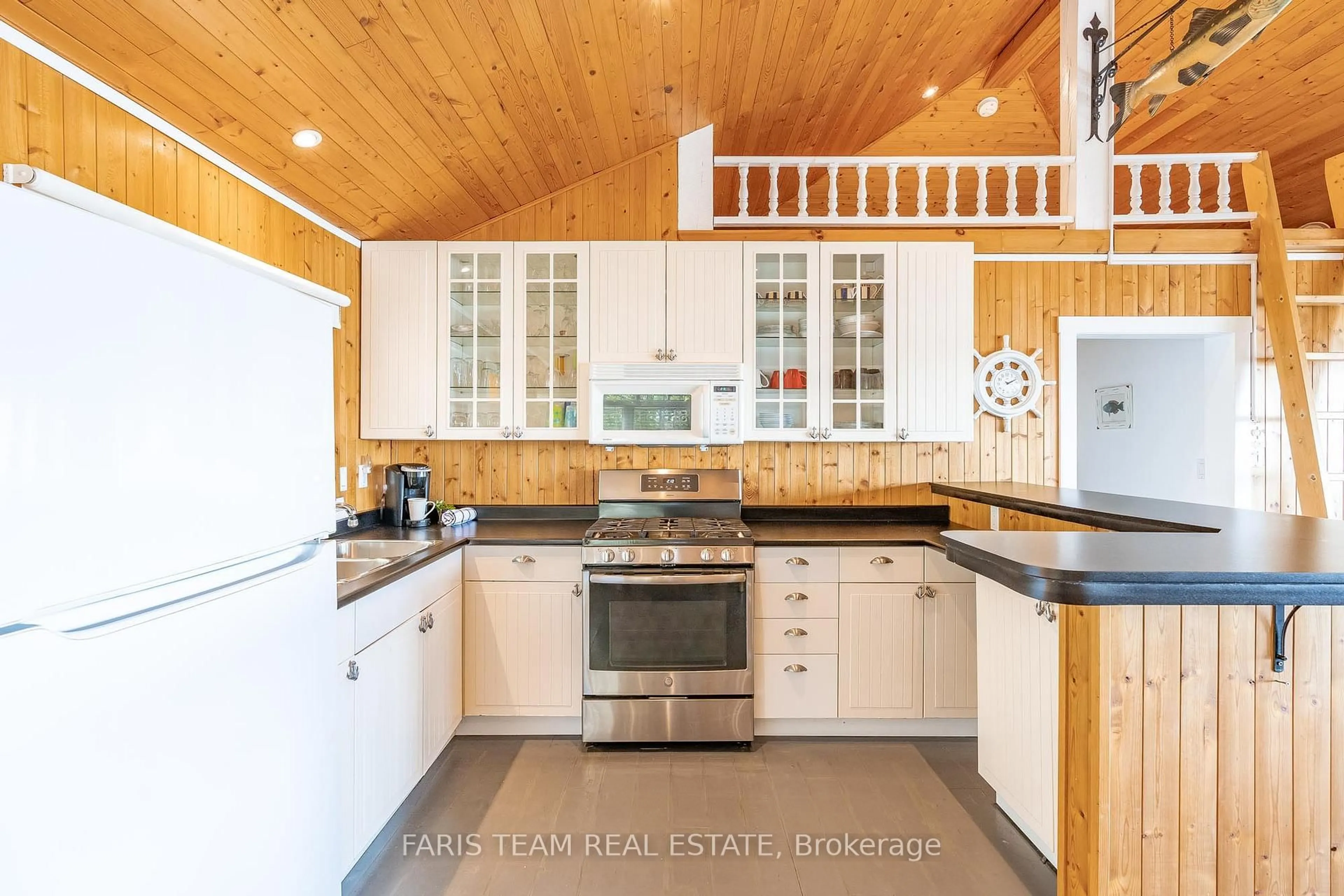 Open concept kitchen, unknown for 1449 Champlain Rd, Tiny Ontario L9M 0C1