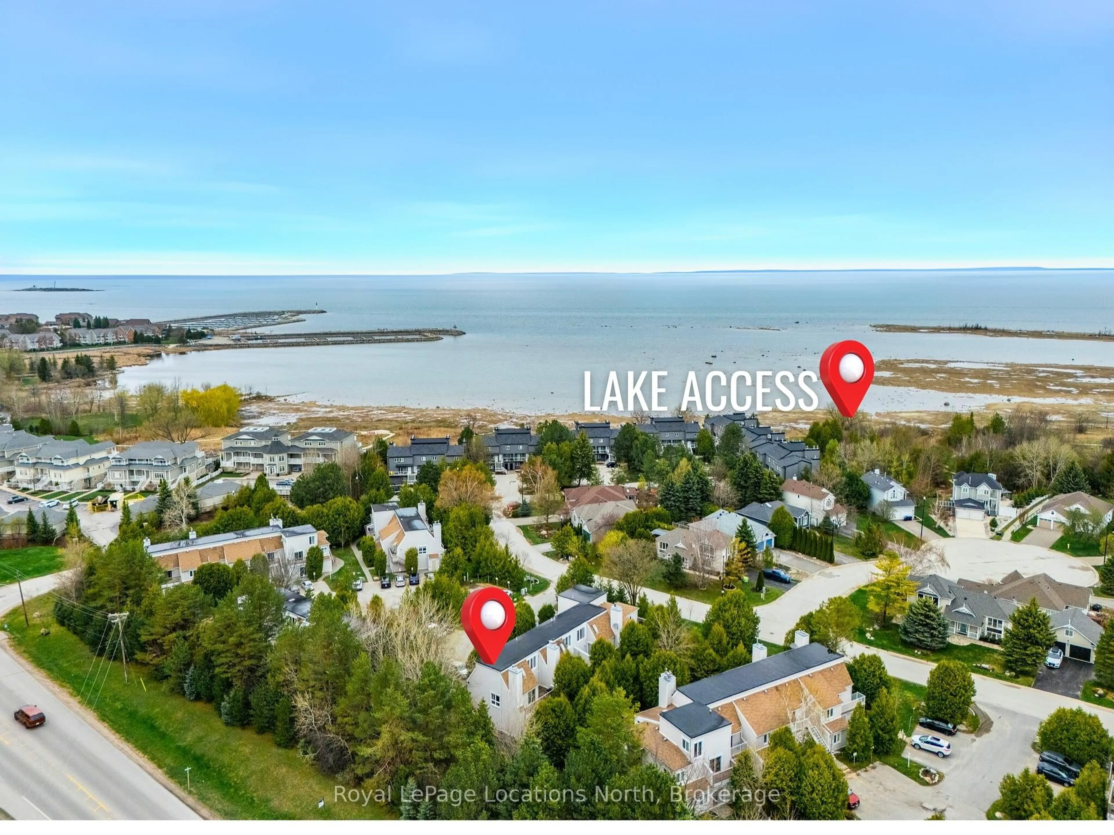 A pic from outside/outdoor area/front of a property/back of a property/a pic from drone, water/lake/river/ocean view for 49 TROTT Blvd #180, Collingwood Ontario L9Y 5B8