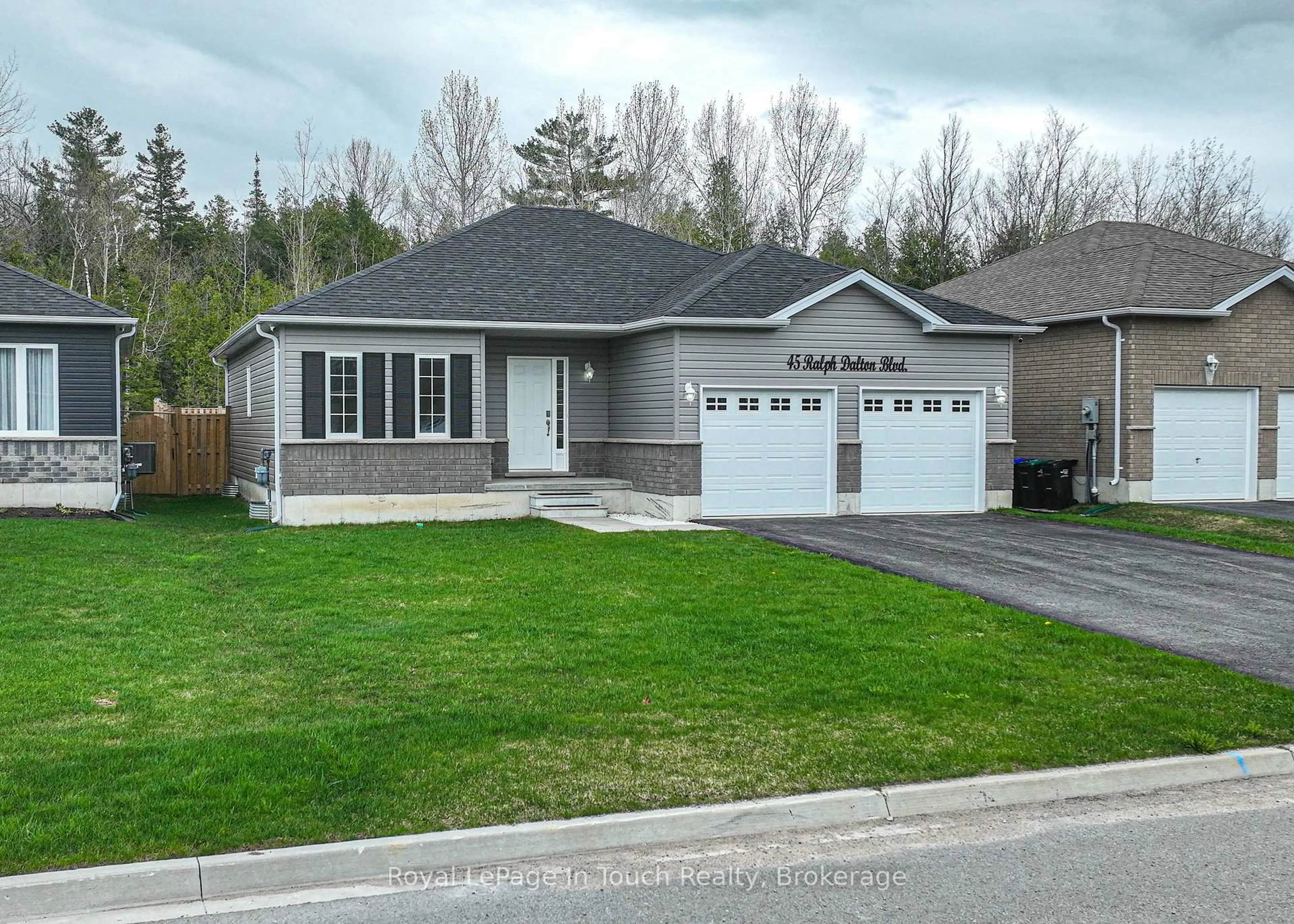 Home with vinyl exterior material, street for 45 Ralph Dalton Blvd, Tay Ontario L0K 2A0