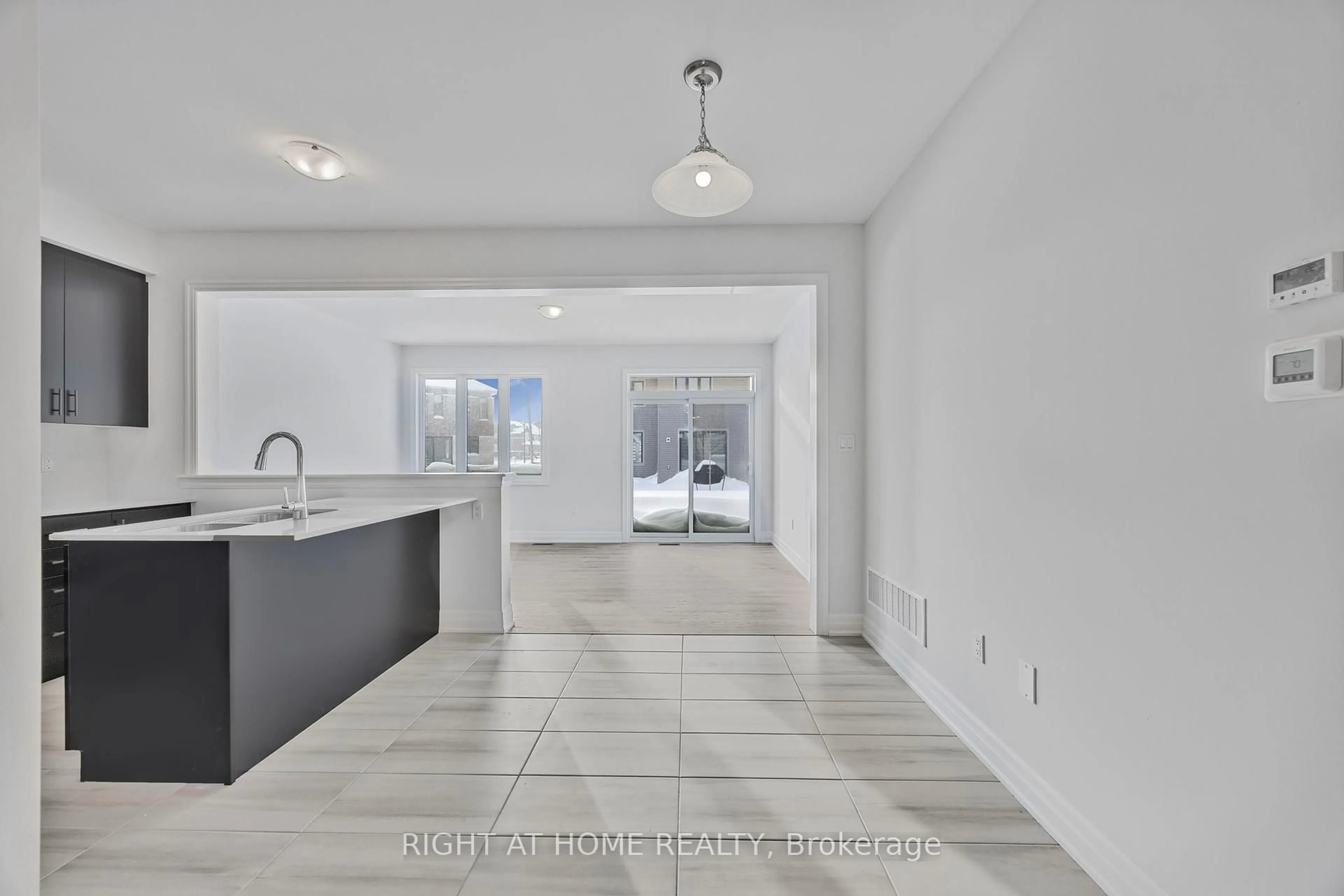 Open concept kitchen, ceramic/tile floor for 52 Del Ray Cres, Wasaga Beach Ontario L9Z 0N8