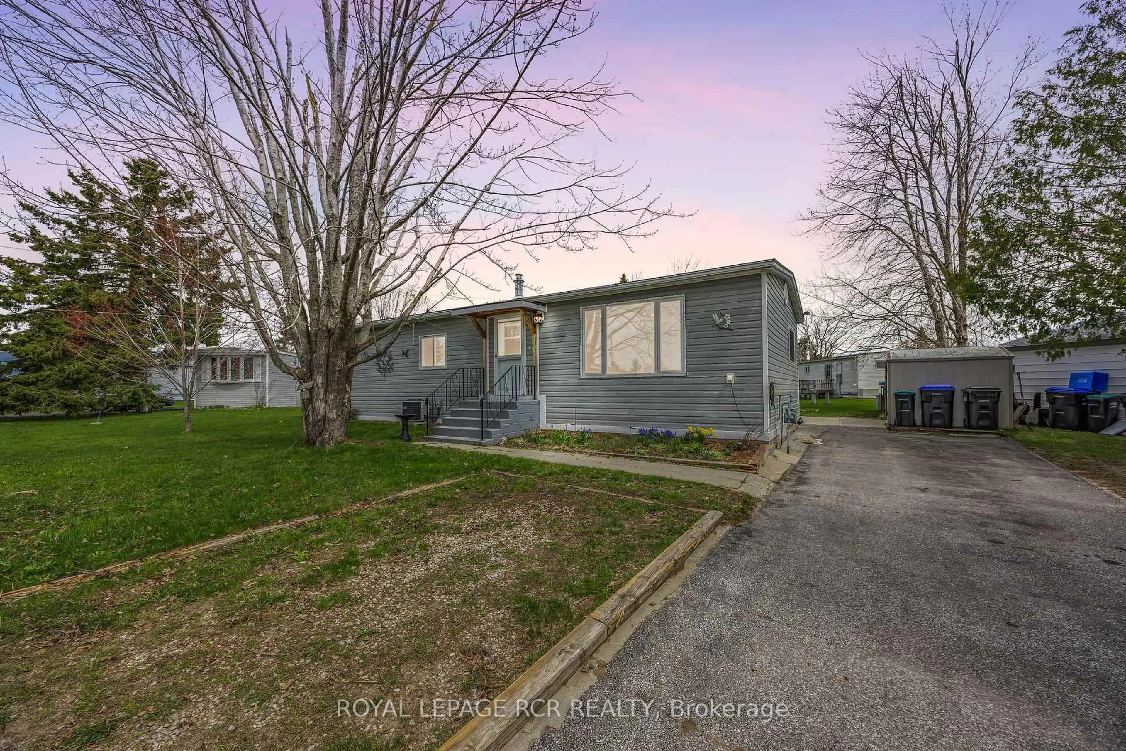 A pic from outside/outdoor area/front of a property/back of a property/a pic from drone, street for 15 Balantrae Dr, Oro-Medonte Ontario L3V 0P9