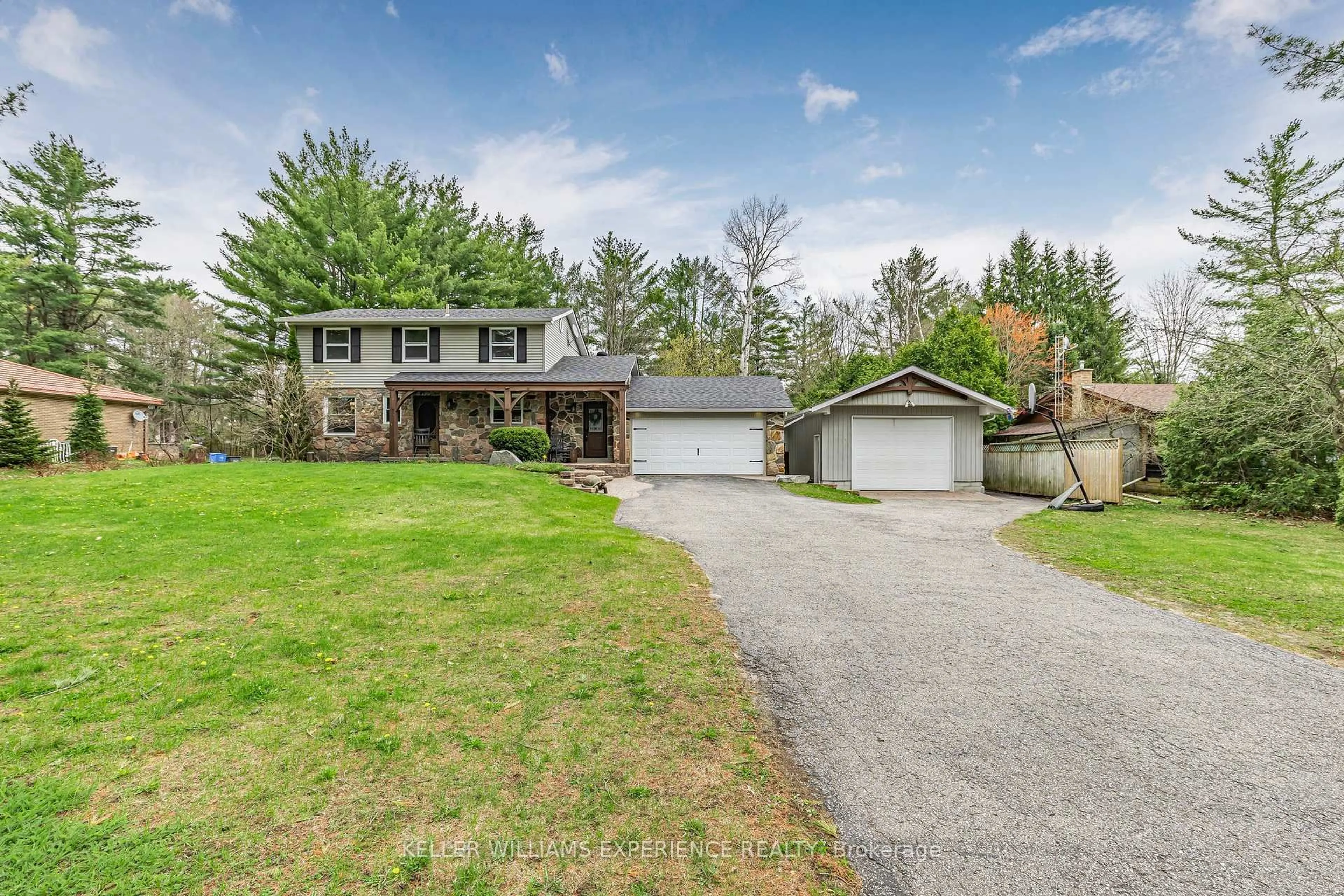 A pic from outside/outdoor area/front of a property/back of a property/a pic from drone, street for 31 Lawrence Ave, Springwater Ontario L9X 0W4