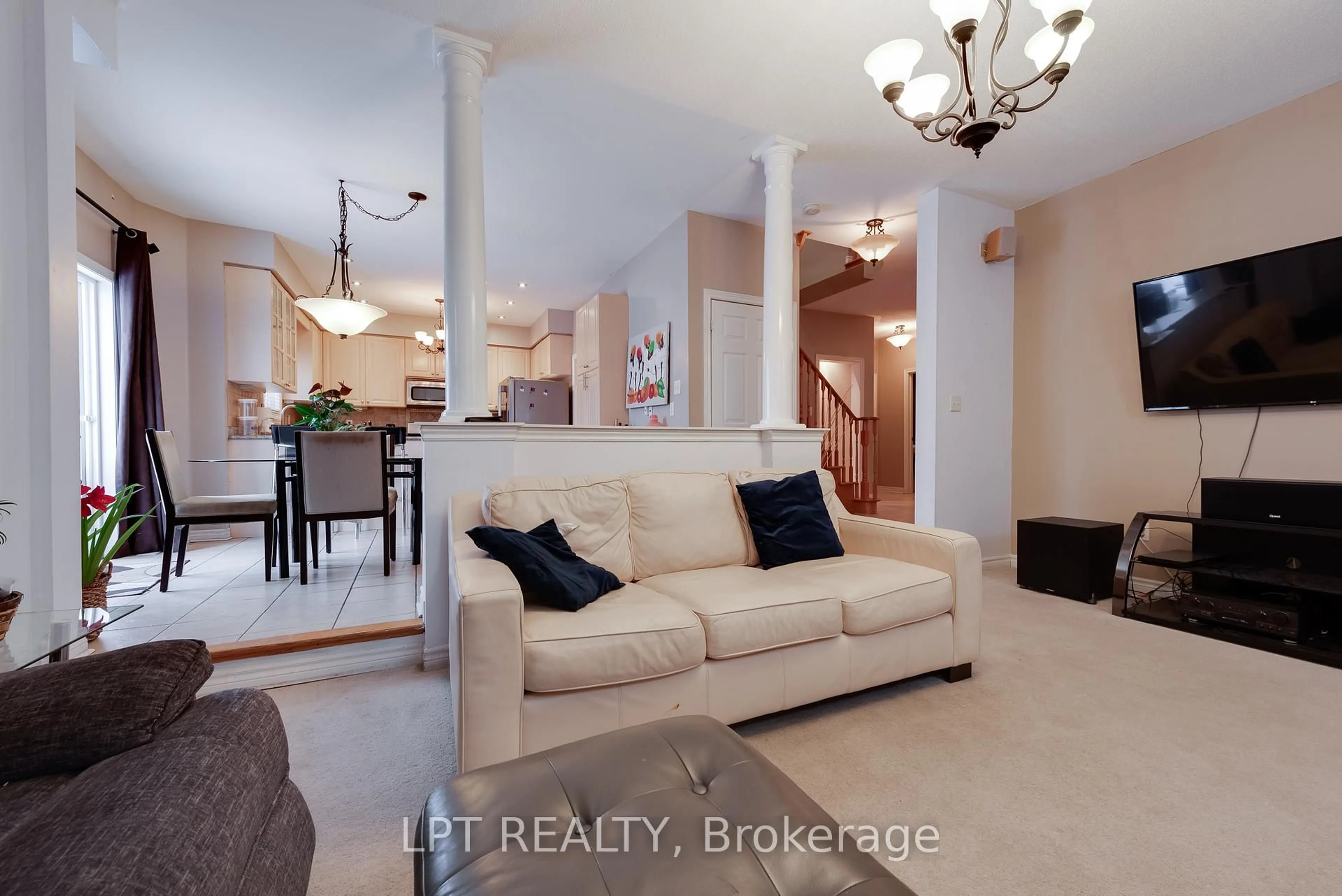 Living room with furniture, ceramic/tile floor for 11 Springwood Crt, Barrie Ontario L4N 5V1