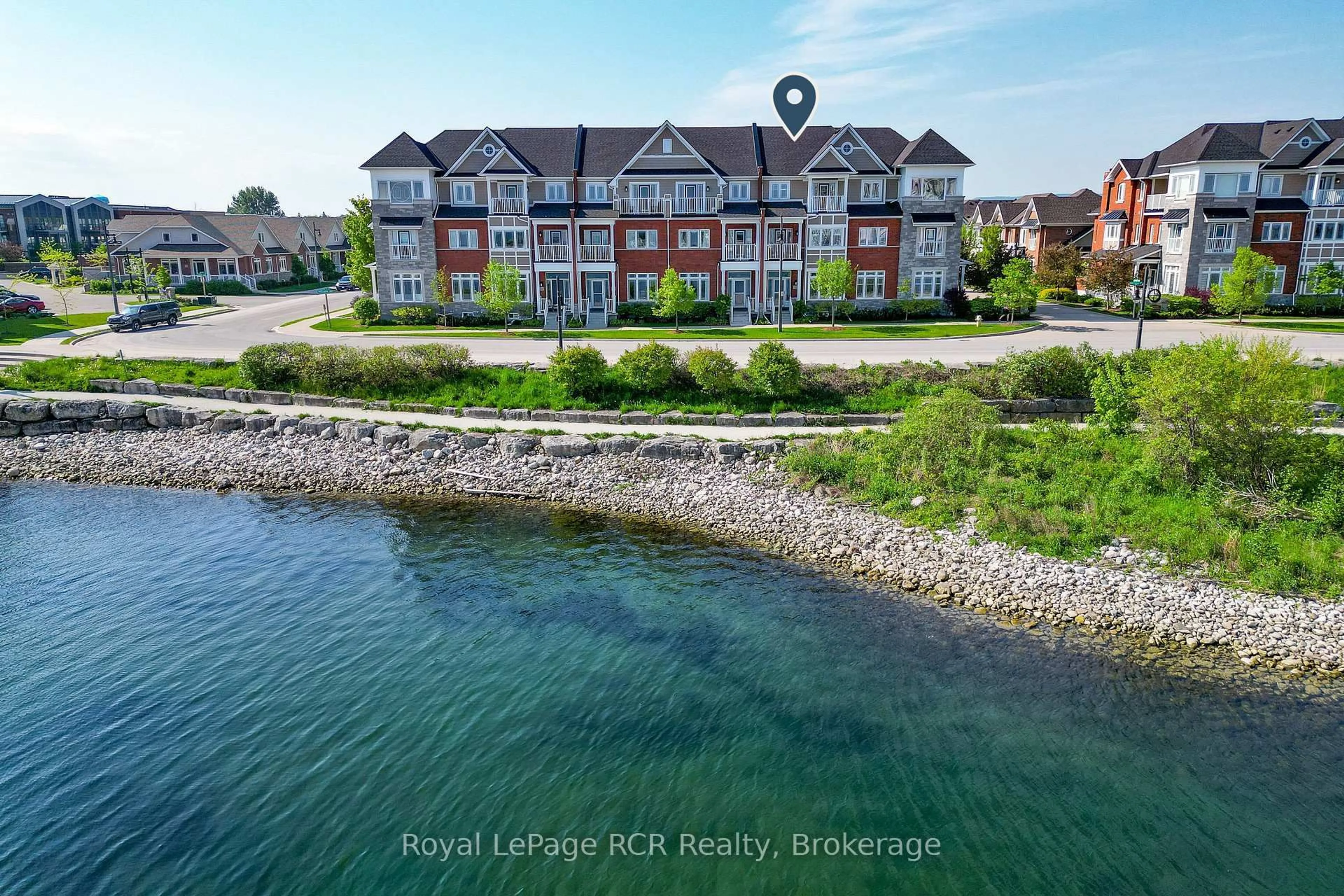 A pic from outside/outdoor area/front of a property/back of a property/a pic from drone, water/lake/river/ocean view for 16 Wheelhouse Cres, Collingwood Ontario L9Y 0J9