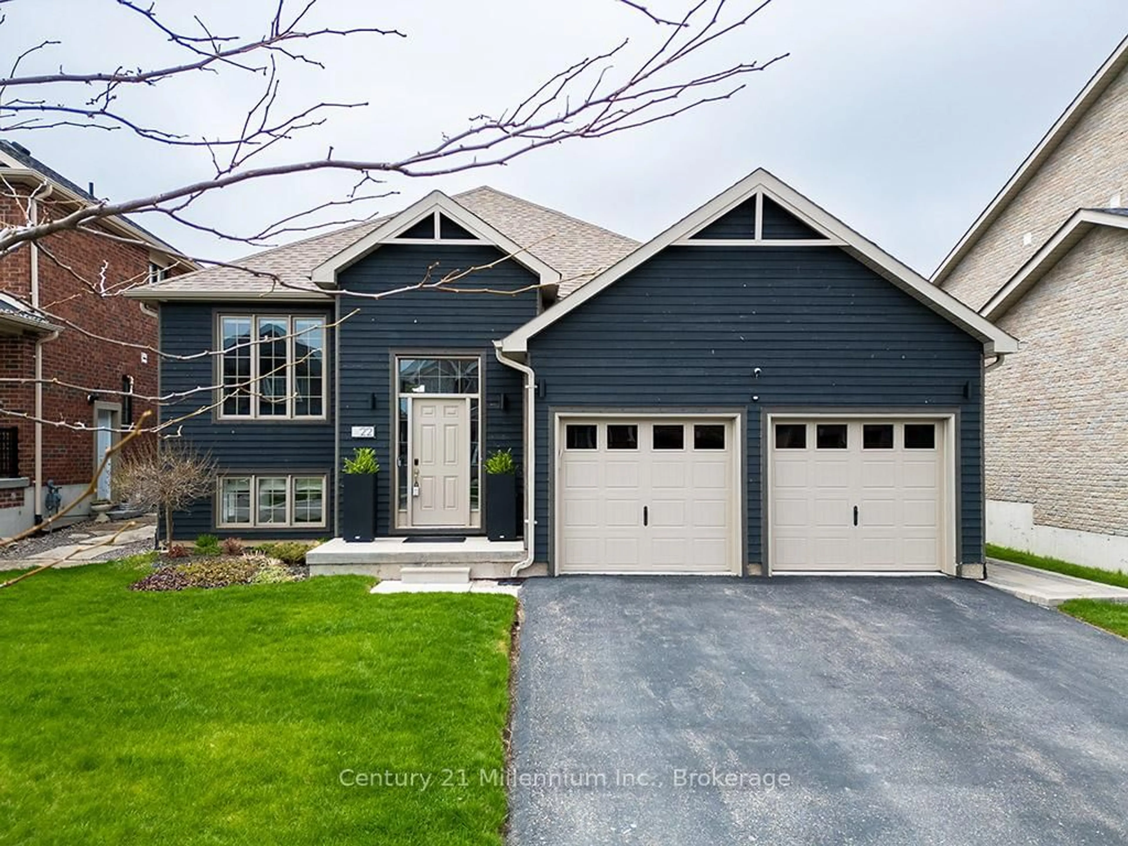 Home with vinyl exterior material, street for 22 Wilson St, Collingwood Ontario L9Y 0Y9