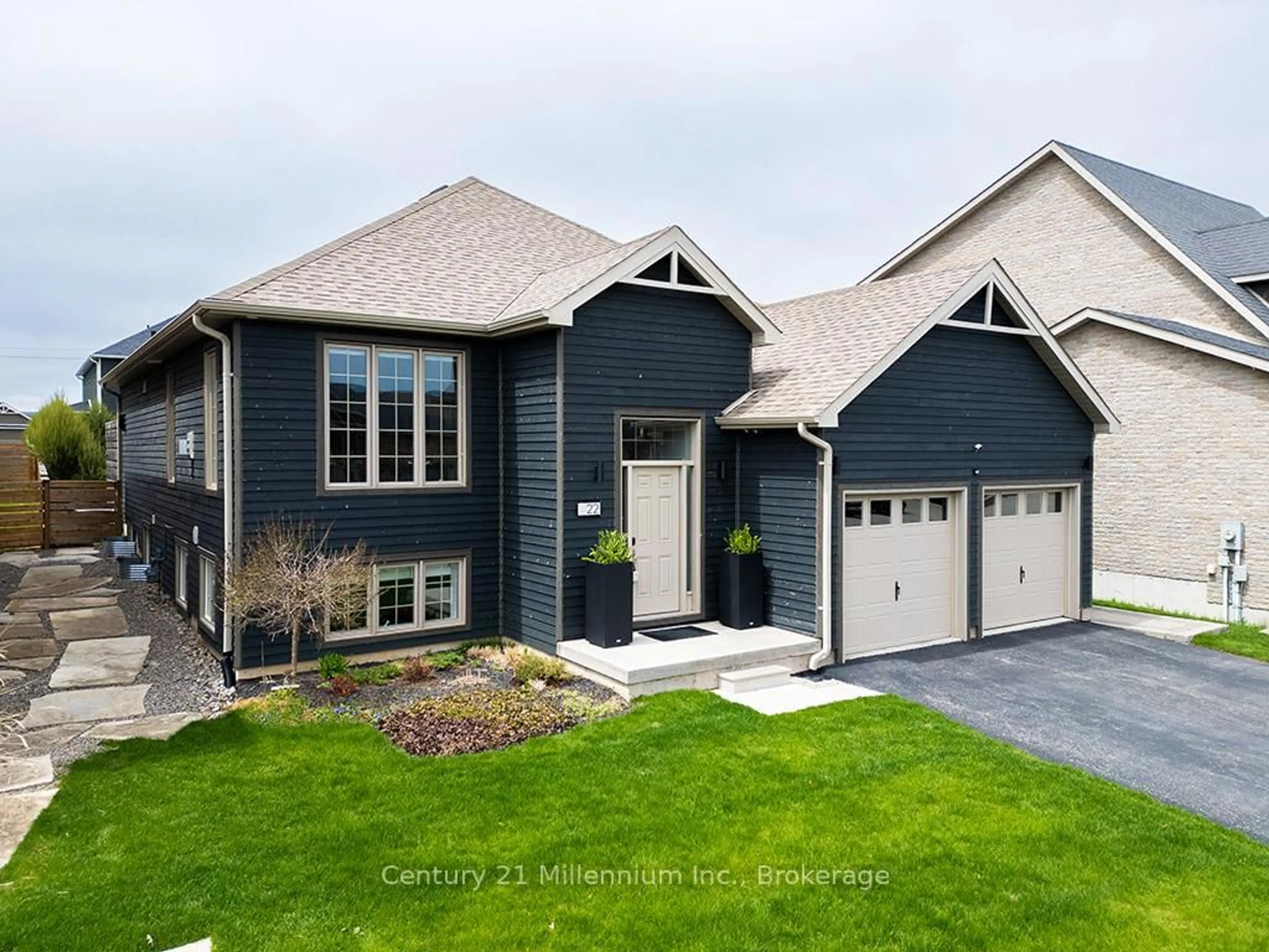 Home with brick exterior material, street for 22 Wilson St, Collingwood Ontario L9Y 0Y9