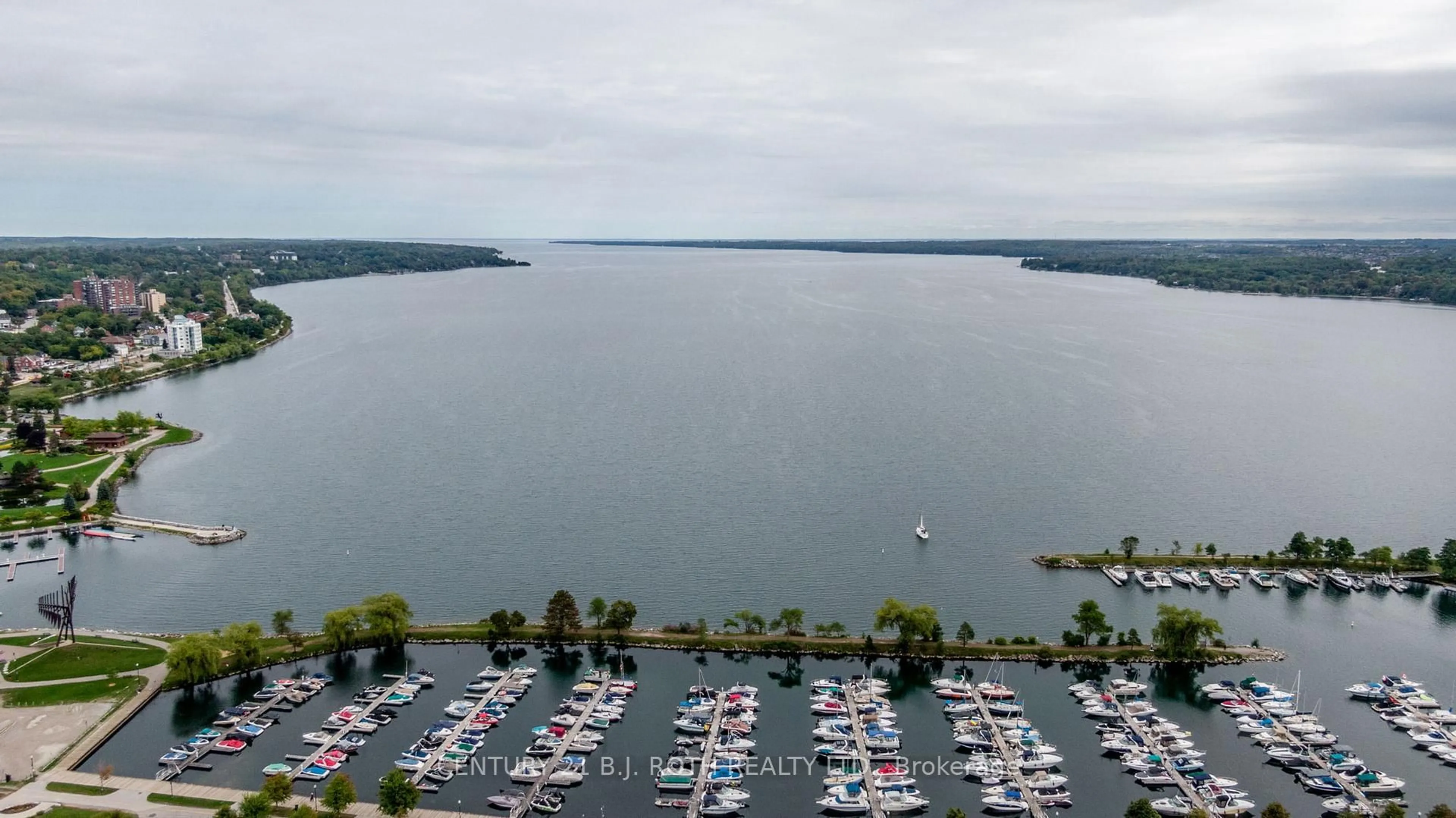 A pic from outside/outdoor area/front of a property/back of a property/a pic from drone, water/lake/river/ocean view for 2 Toronto St #PH1 1, Barrie Ontario L4N 9R2