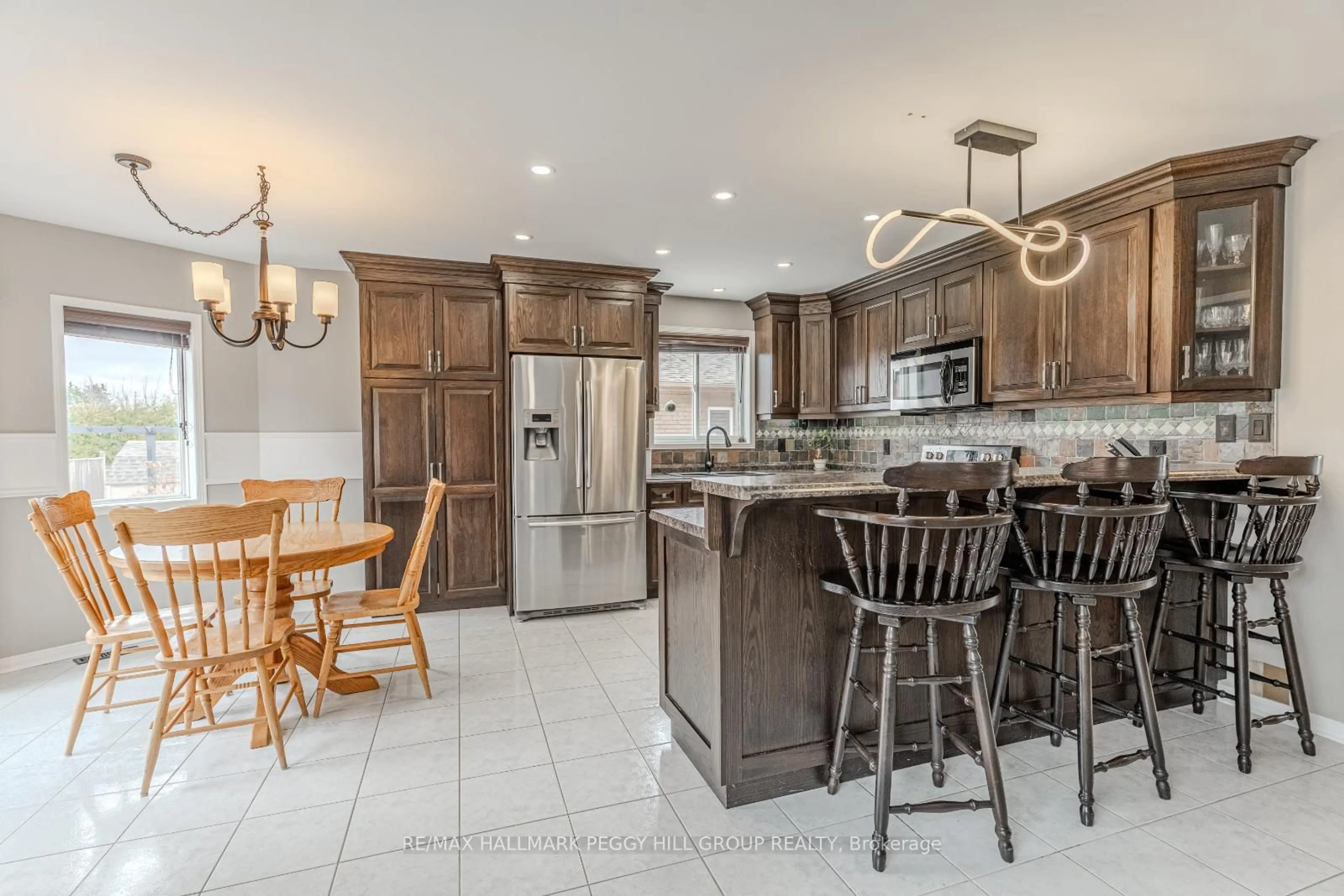 Open concept kitchen, ceramic/tile floor for 38 Benson Dr, Barrie Ontario L4N 7Y1