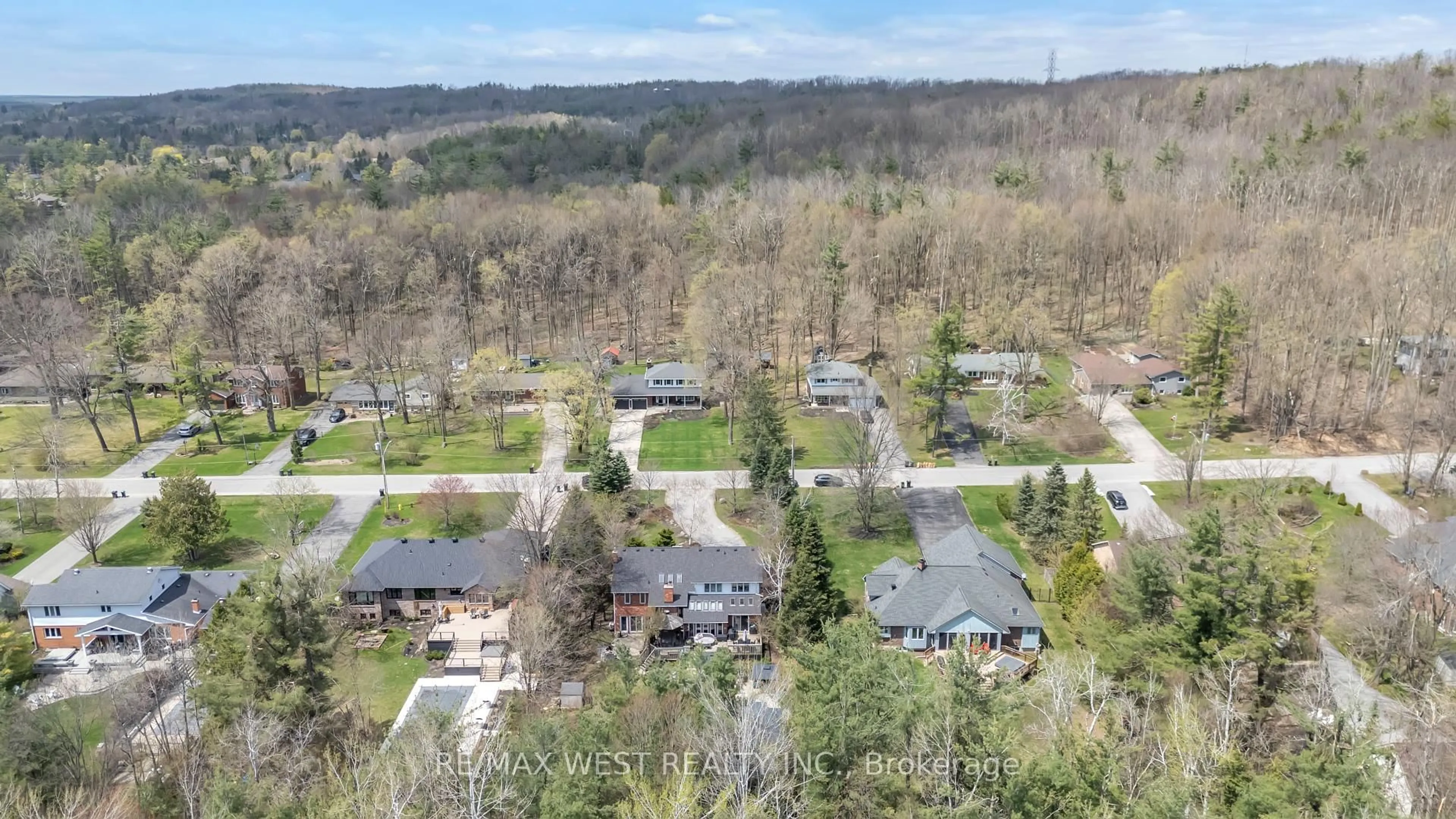 A pic from outside/outdoor area/front of a property/back of a property/a pic from drone, forest/trees view for 35 Jodies Lane, Springwater Ontario L0L 1X1