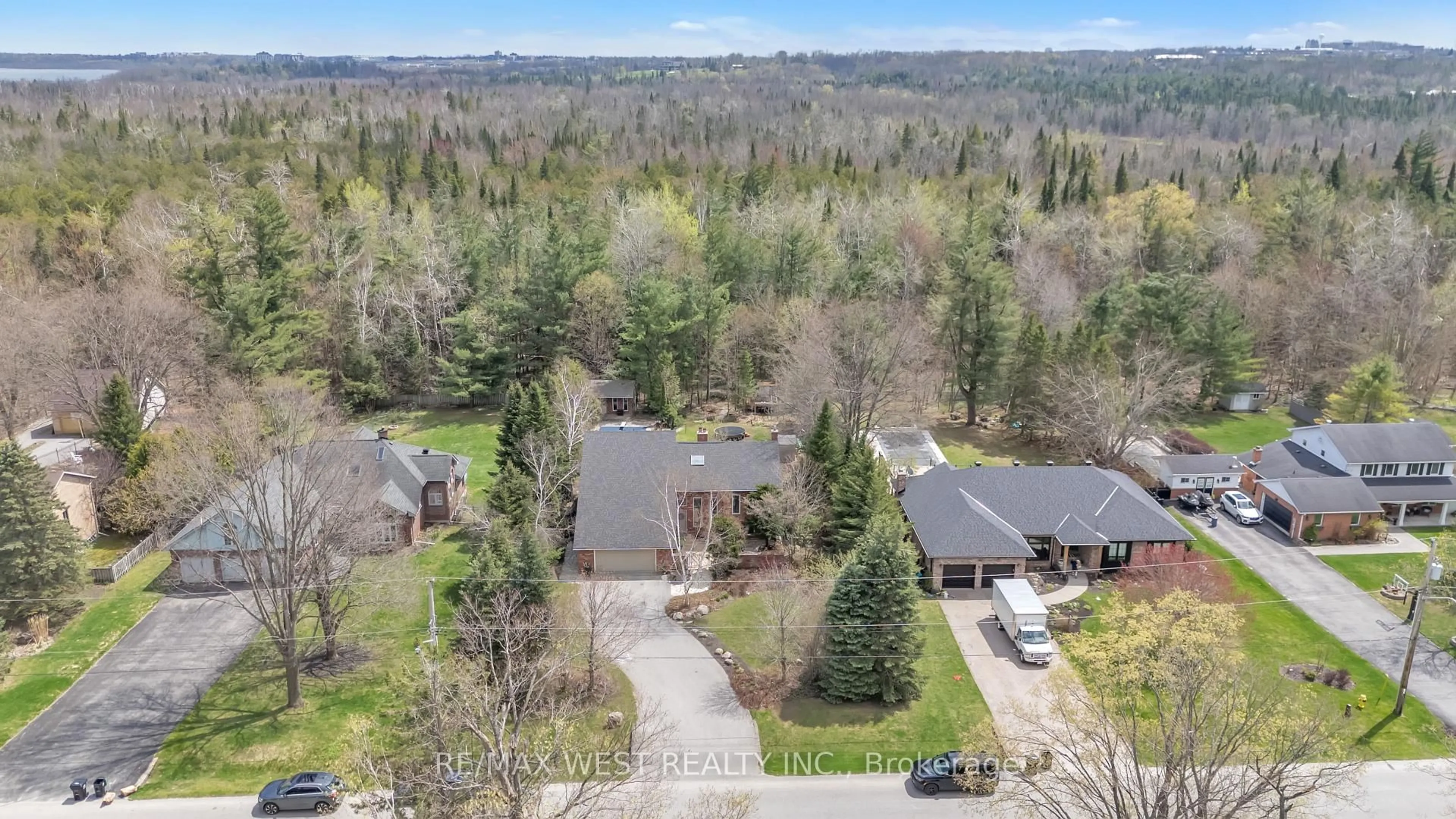 A pic from outside/outdoor area/front of a property/back of a property/a pic from drone, unknown for 35 Jodies Lane, Springwater Ontario L0L 1X1
