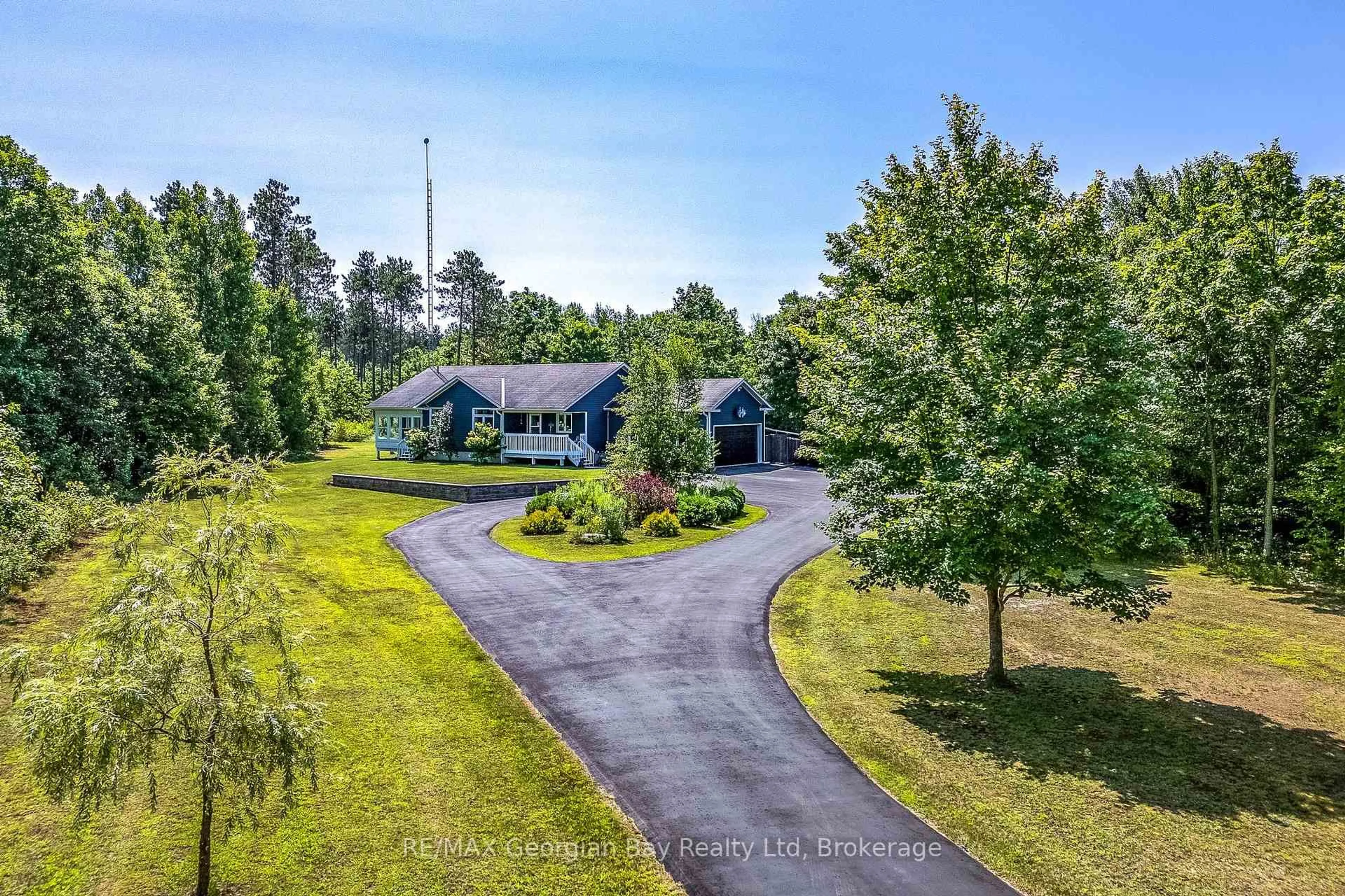 A pic from outside/outdoor area/front of a property/back of a property/a pic from drone, unknown for 63 Concession 9 East Concession, Tiny Ontario L0L 2J0