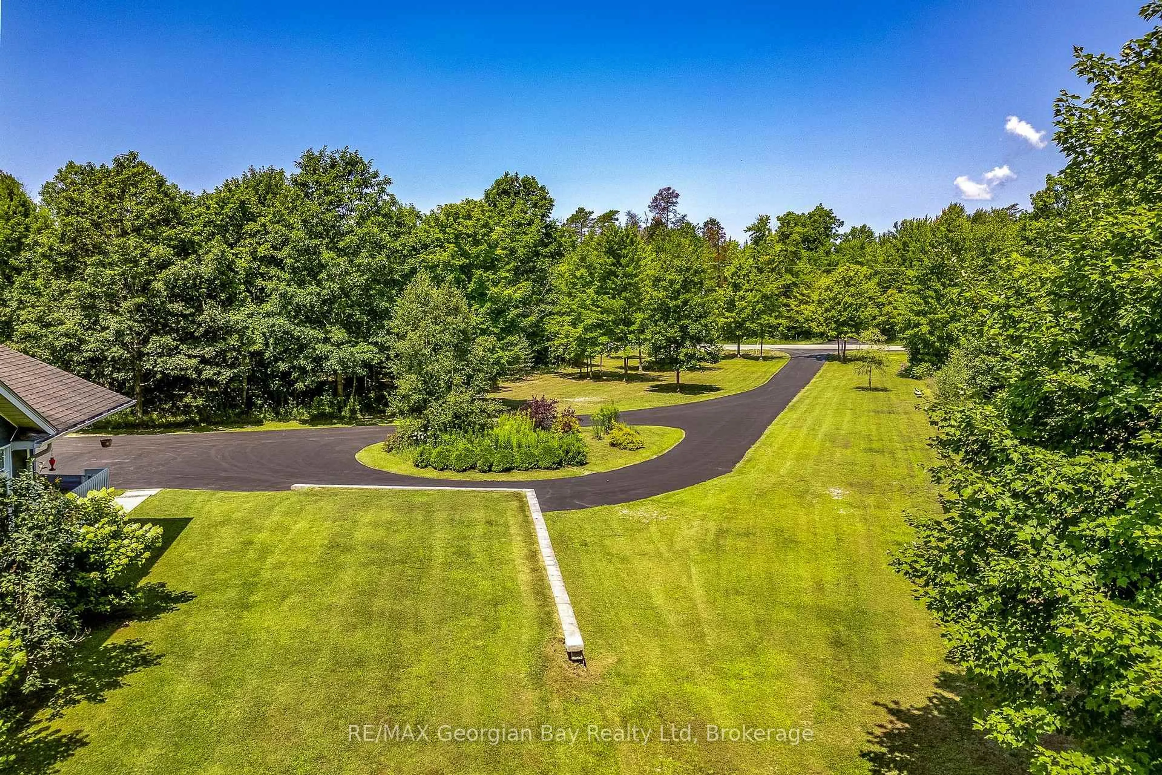 A pic from outside/outdoor area/front of a property/back of a property/a pic from drone, water/lake/river/ocean view for 63 Concession 9 East Concession, Tiny Ontario L0L 2J0