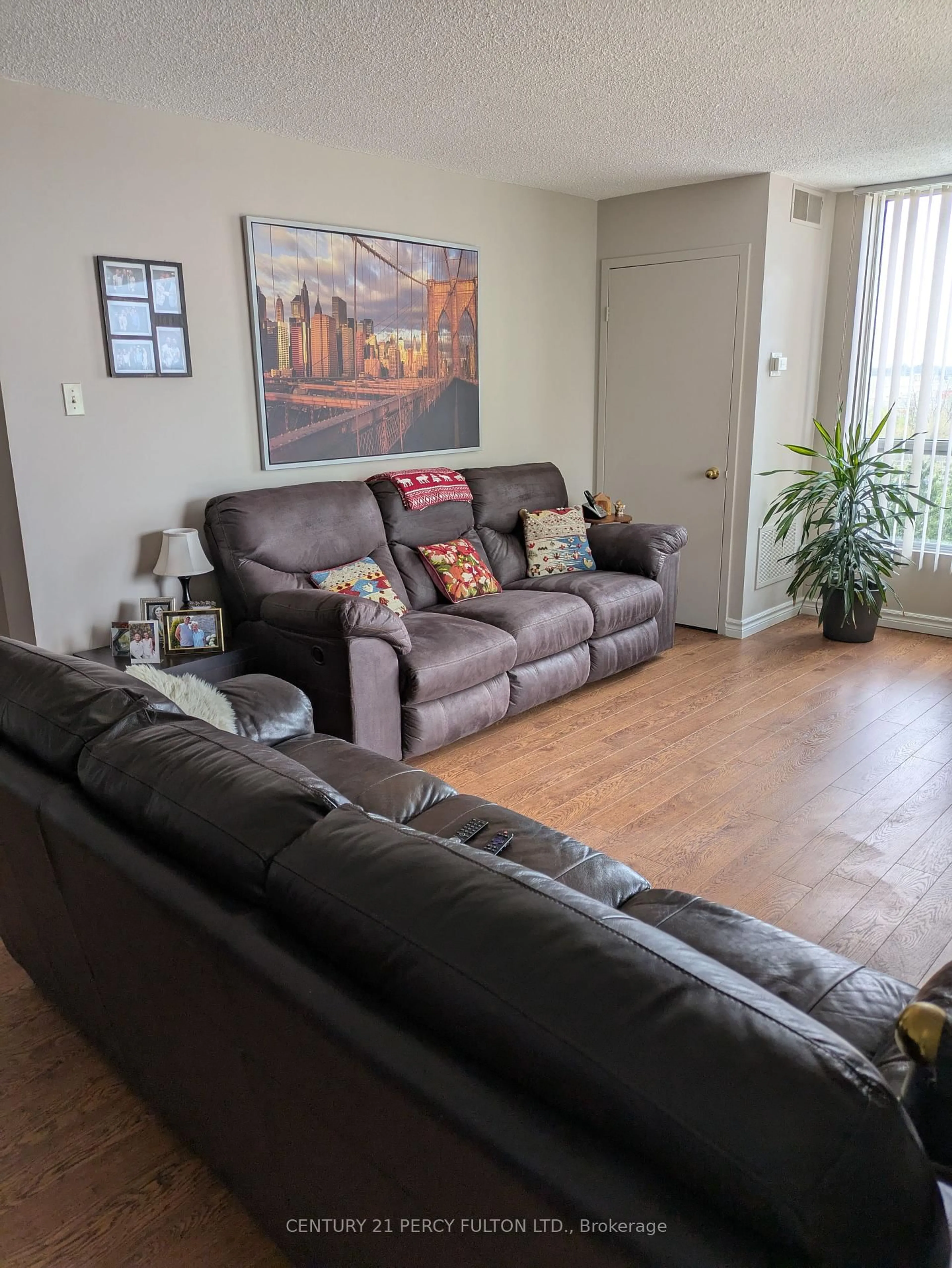 Living room with furniture, unknown for 75 Ellen St #1004, Barrie Ontario L4N 7R6