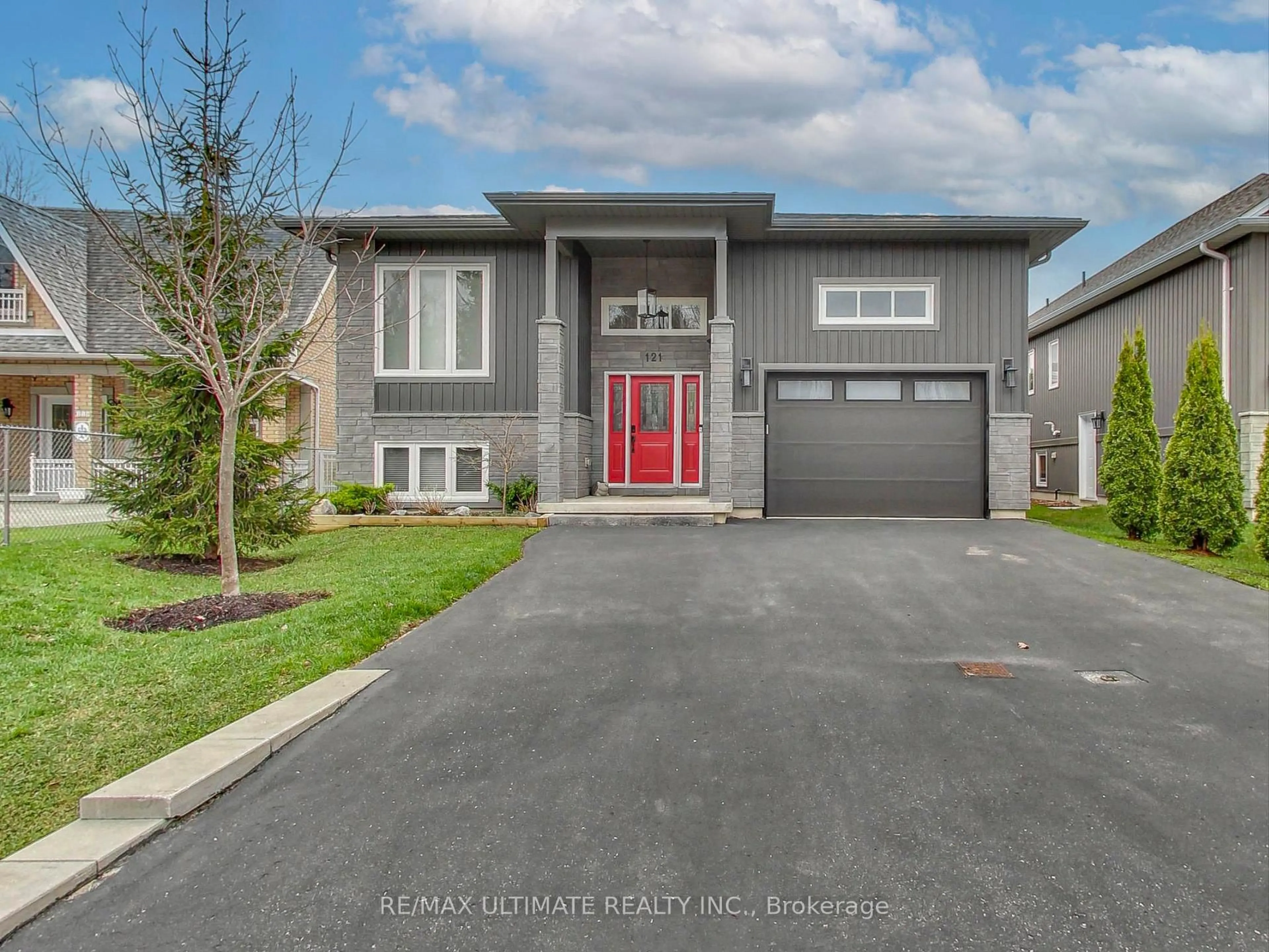 Home with brick exterior material, street for 121 Lily Dr, Wasaga Beach Ontario L9Z 2Z2