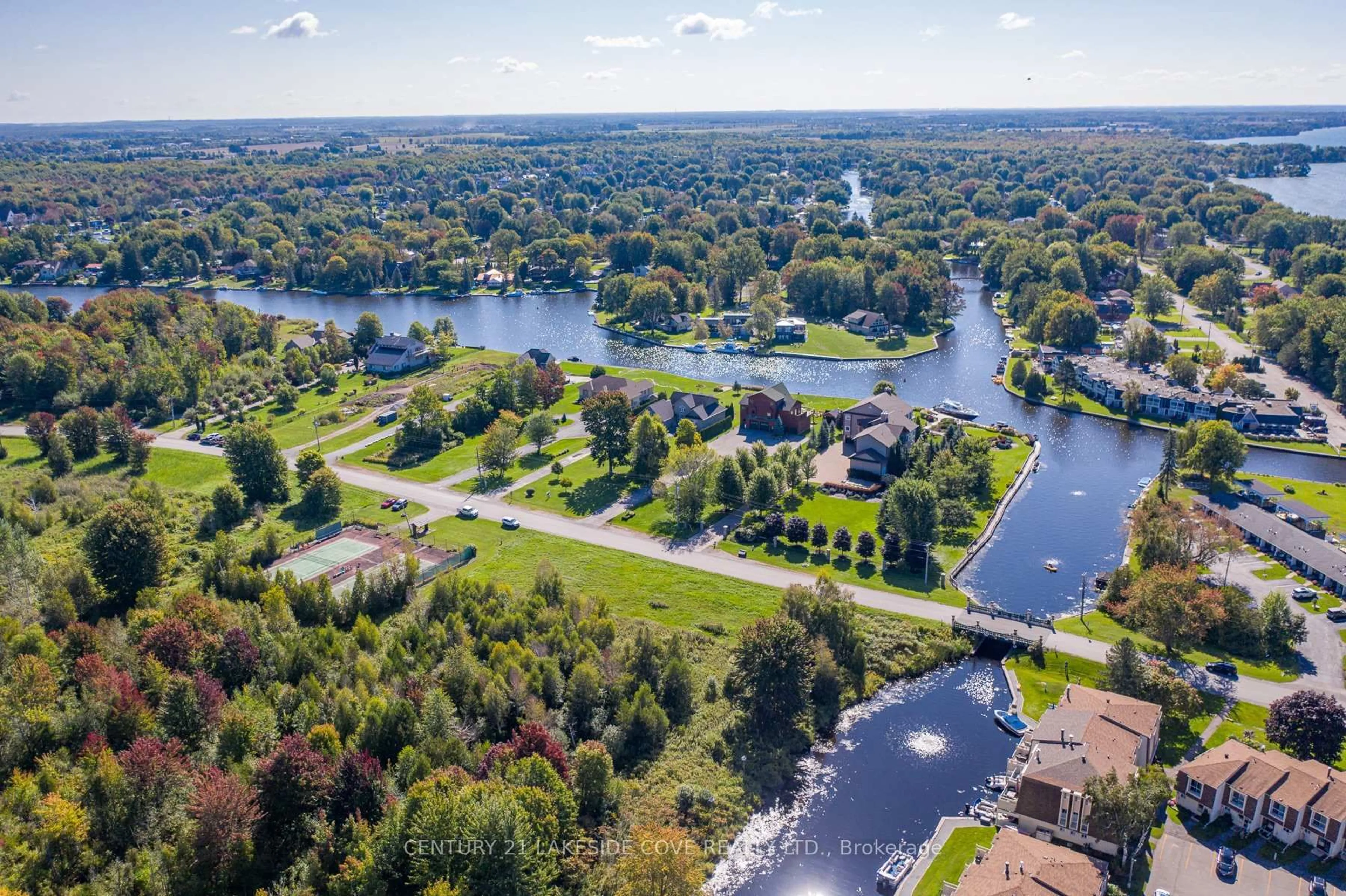 A pic from outside/outdoor area/front of a property/back of a property/a pic from drone, water/lake/river/ocean view for 4 Paradise Blvd #Unit 5, Ramara Ontario L0K 1B0