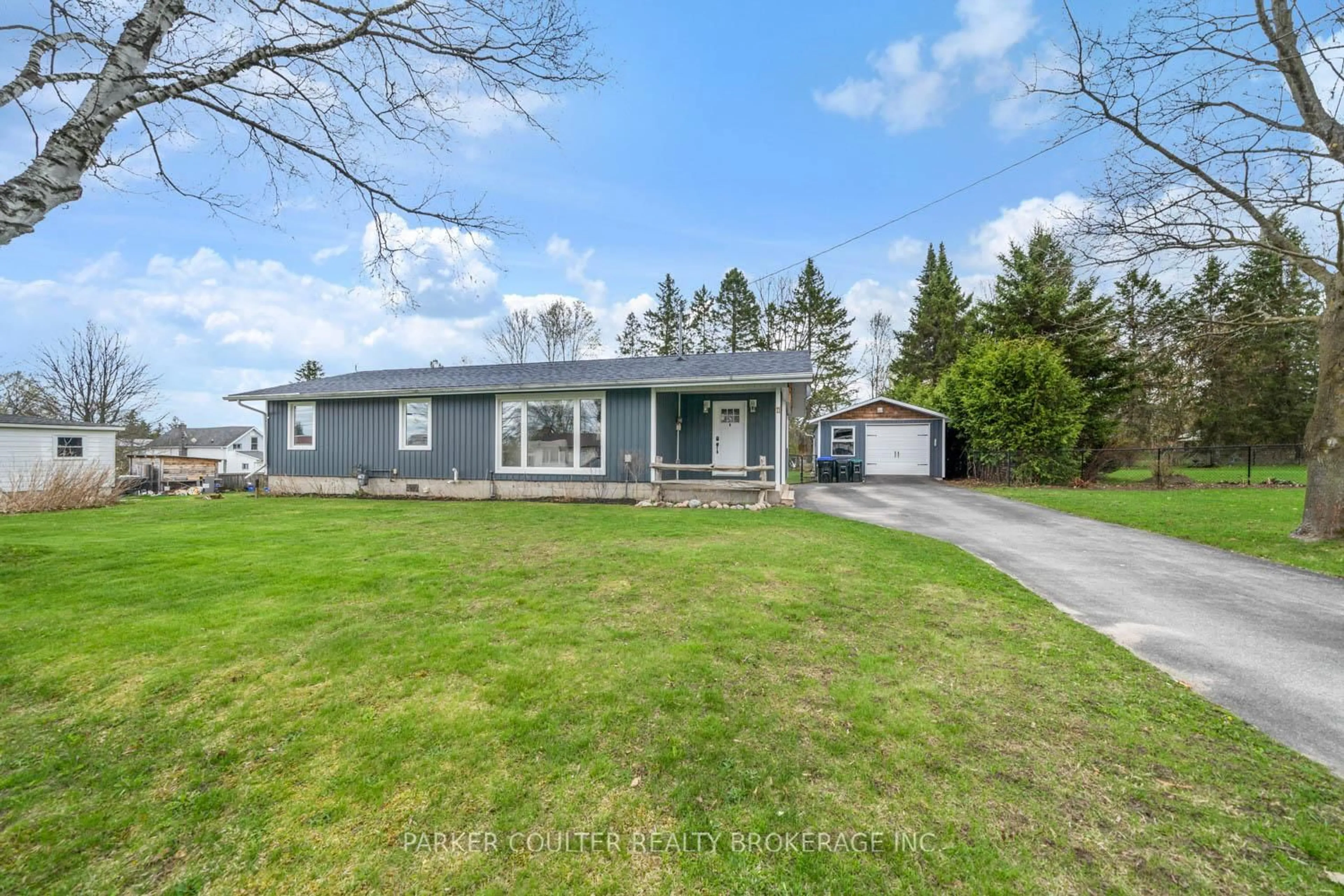 A pic from outside/outdoor area/front of a property/back of a property/a pic from drone, street for 11 Albert St, Springwater Ontario L0L 1V0