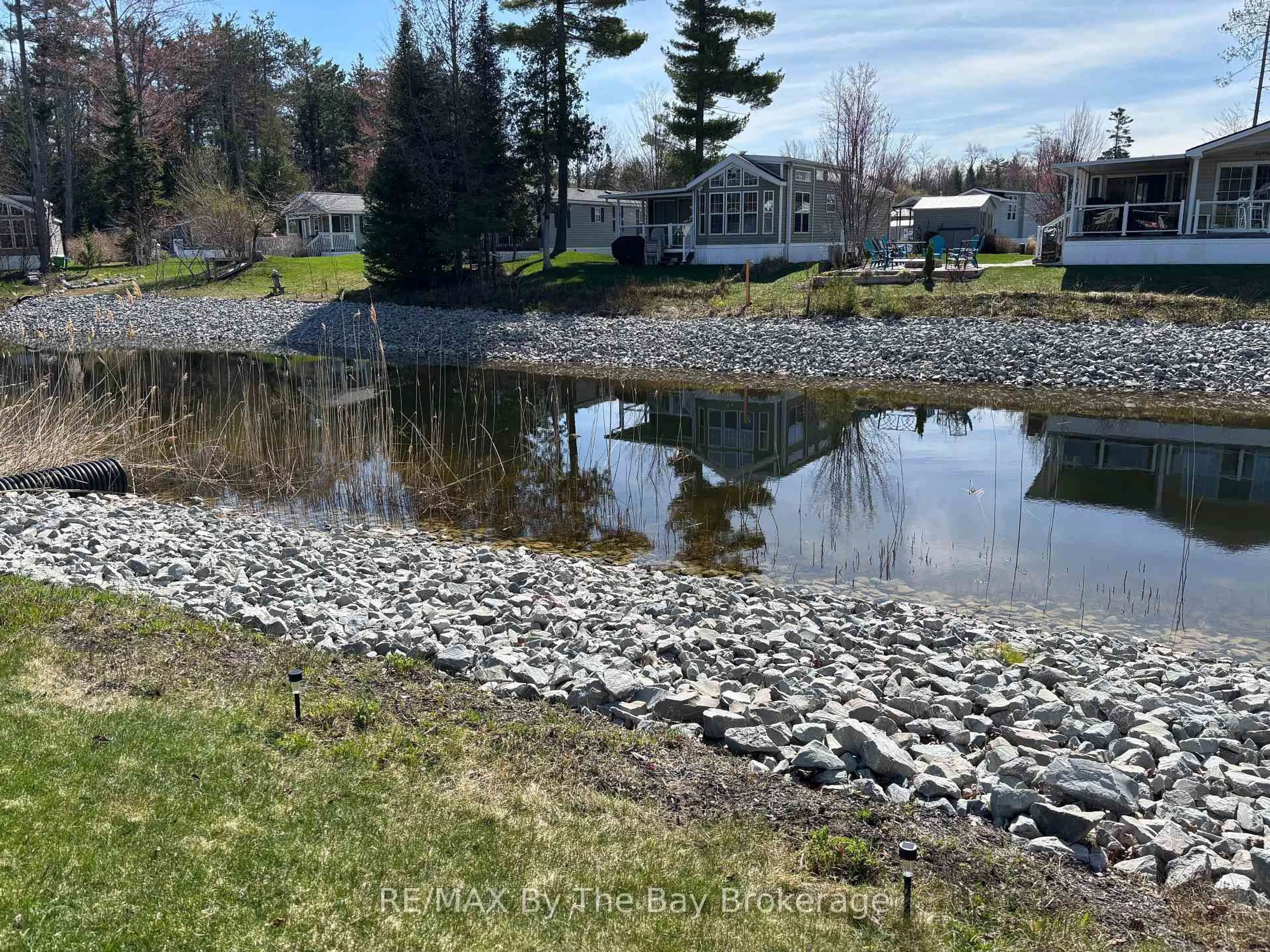 A pic from outside/outdoor area/front of a property/back of a property/a pic from drone, water/lake/river/ocean view for 9 KENORA Tr, Wasaga Beach Ontario L9Z 1X7