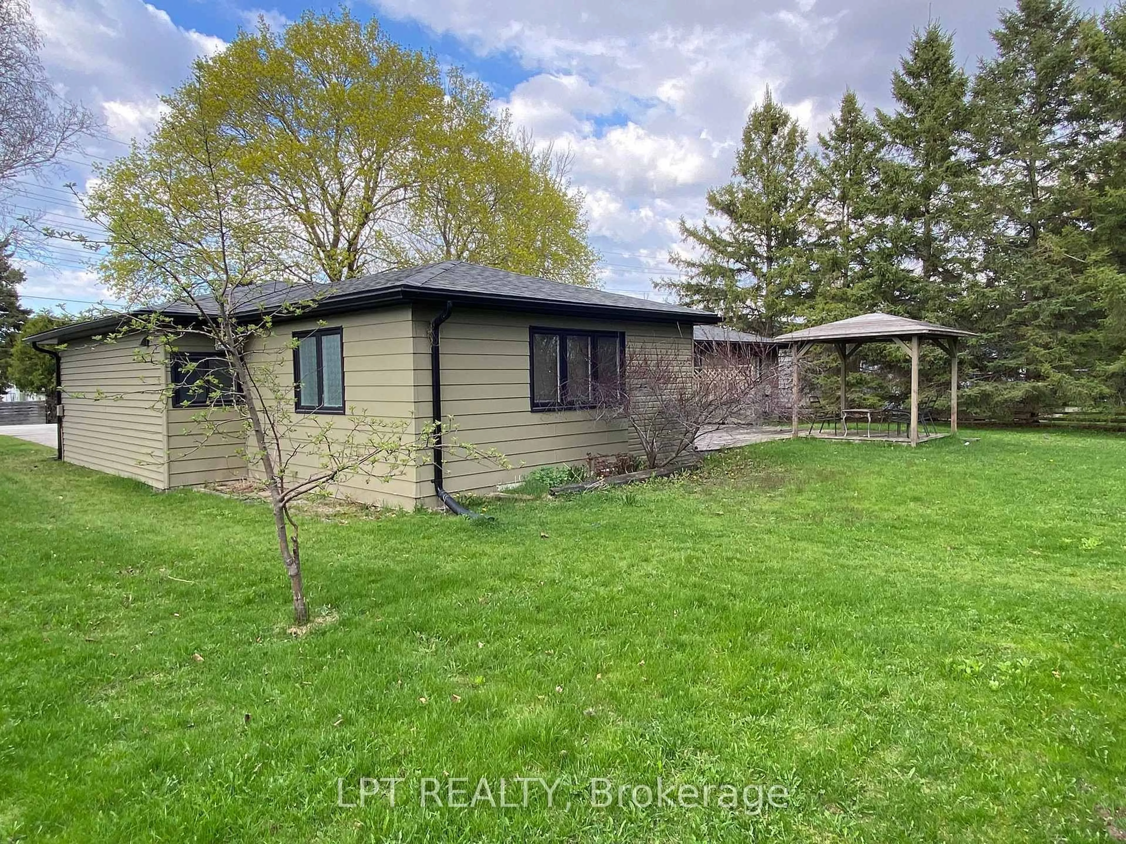 A pic from outside/outdoor area/front of a property/back of a property/a pic from drone, water/lake/river/ocean view for 205 Christopher St, Clearview Ontario L0M 1S0