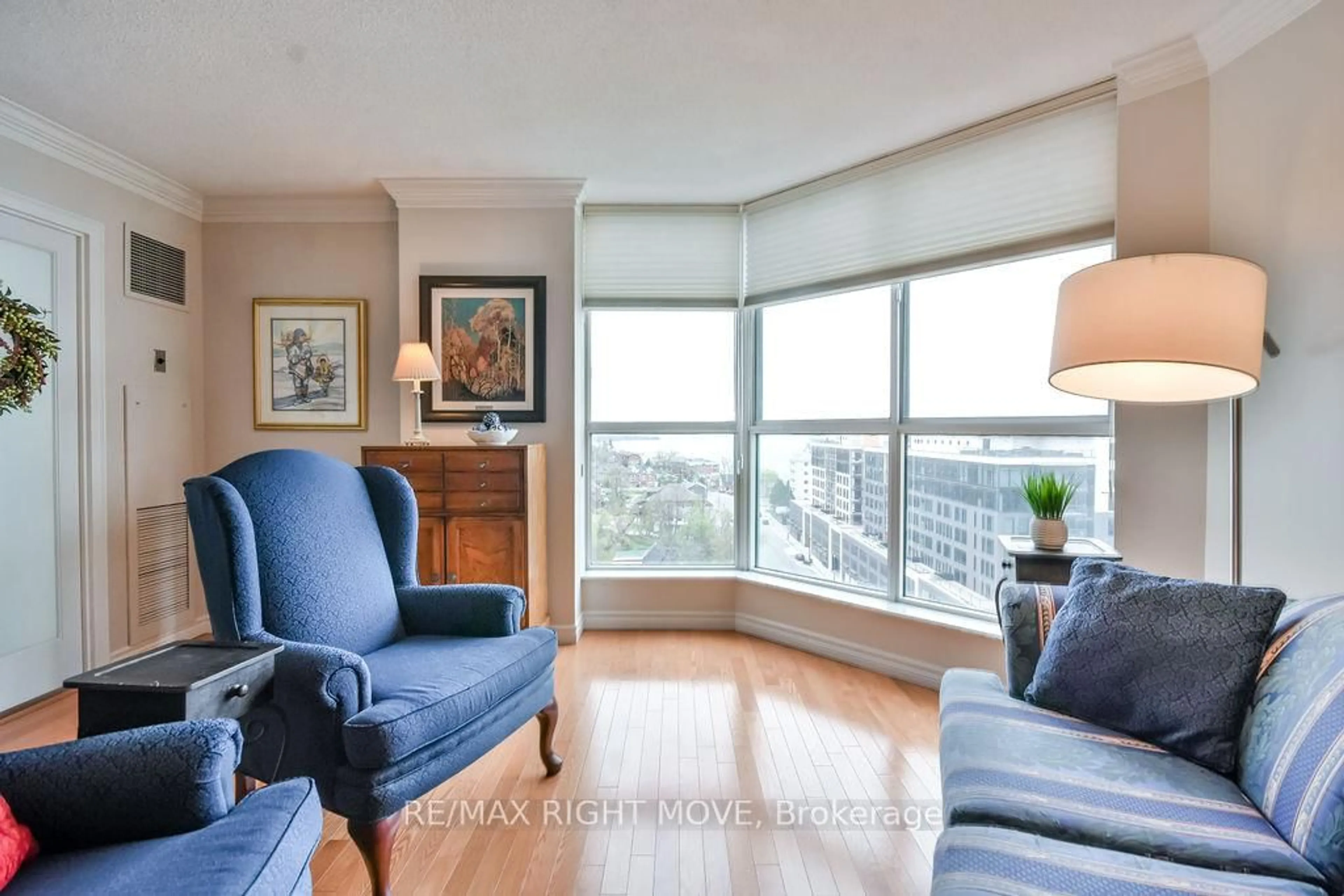 Living room with furniture, wood/laminate floor for 150 Dunlop St #1108, Barrie Ontario L4M 6H1