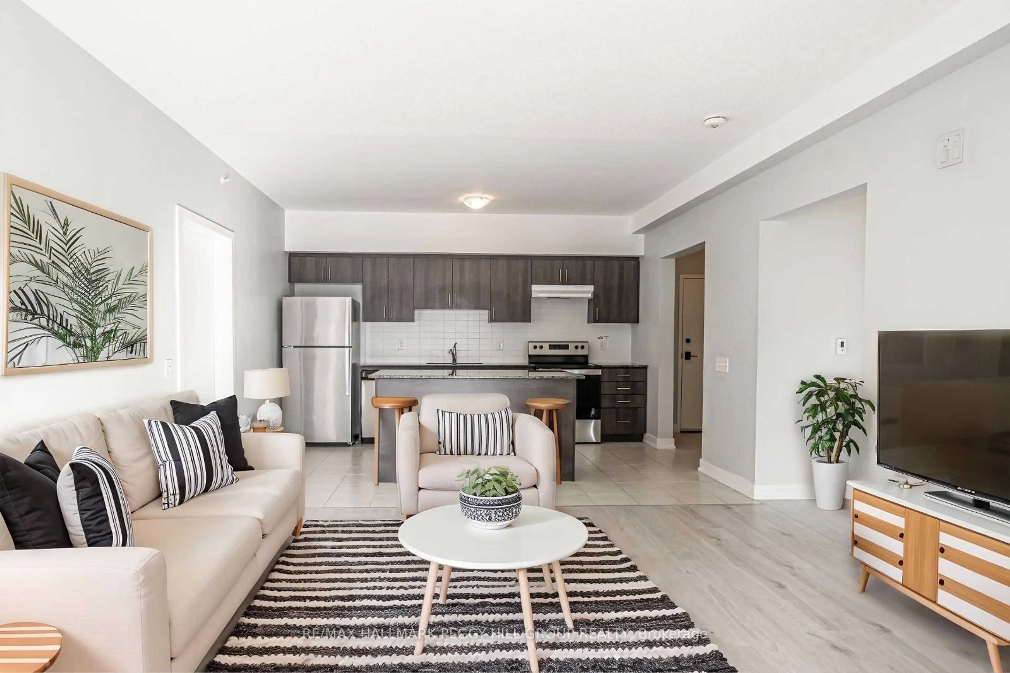 Living room with furniture, unknown for 4 Spice Way #215, Barrie Ontario L9J 0M2
