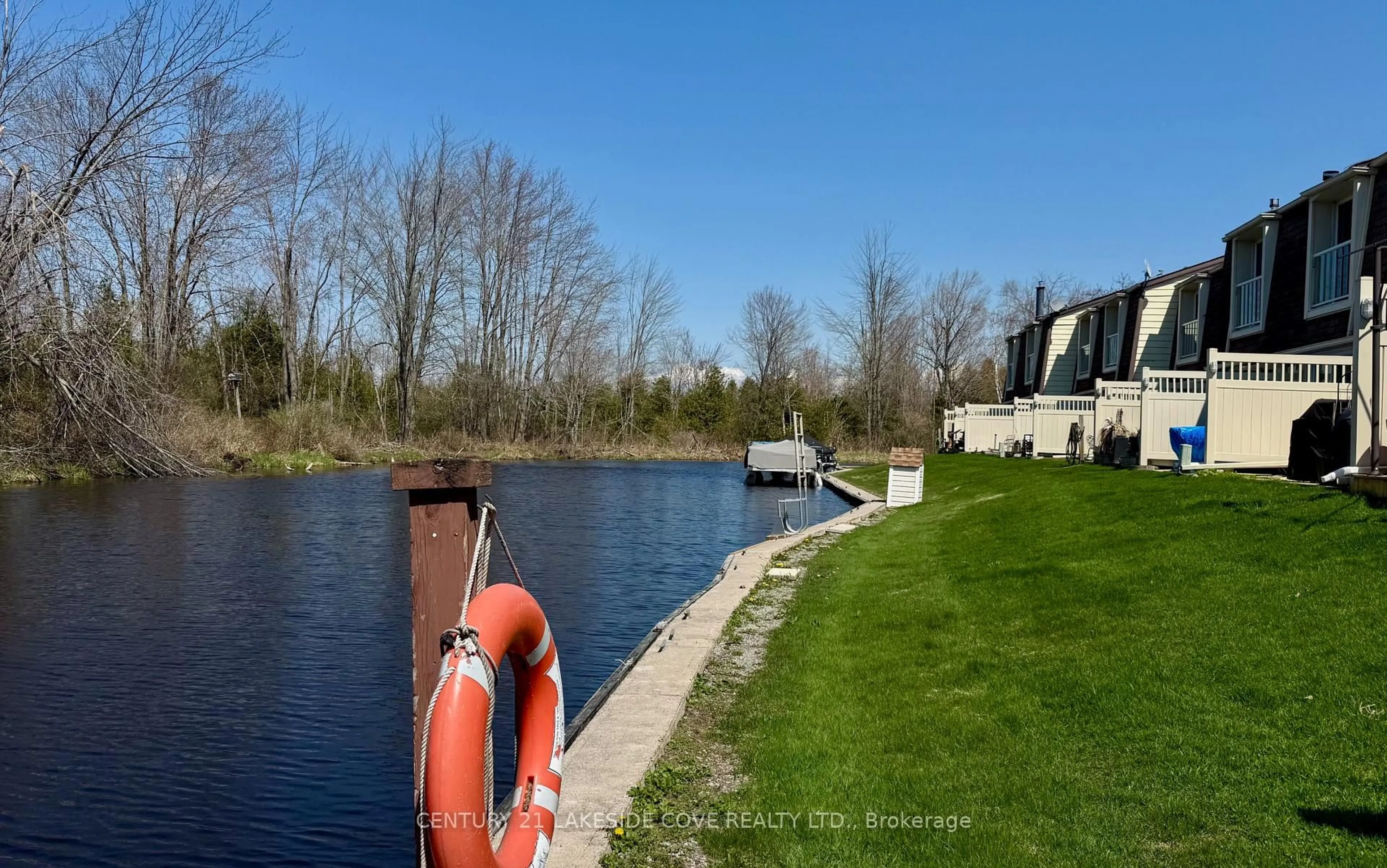 A pic from outside/outdoor area/front of a property/back of a property/a pic from drone, water/lake/river/ocean view for 4 Paradise Blvd #19, Ramara Ontario L0K 1B0