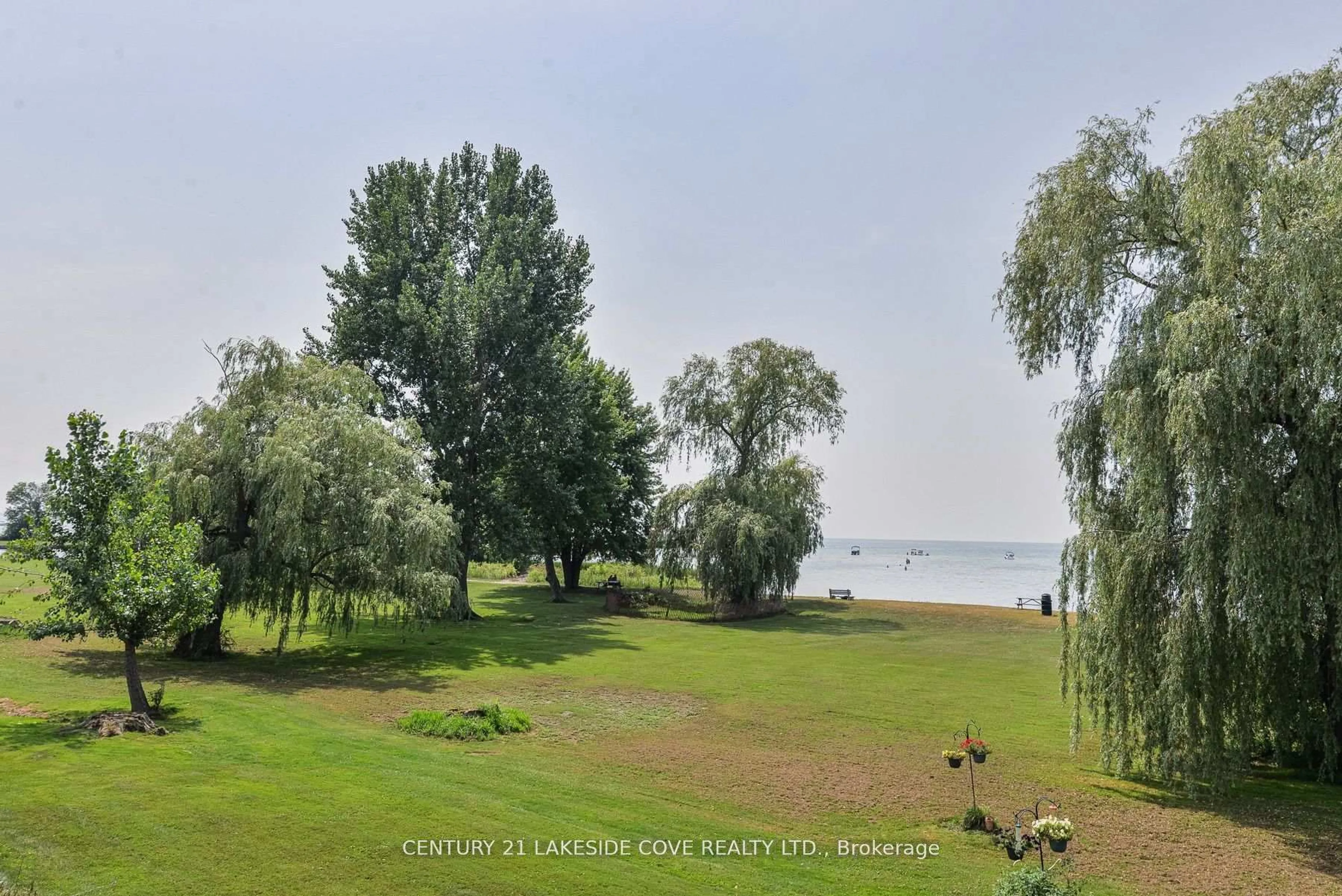 A pic from outside/outdoor area/front of a property/back of a property/a pic from drone, water/lake/river/ocean view for 4 Paradise Blvd #19, Ramara Ontario L0K 1B0